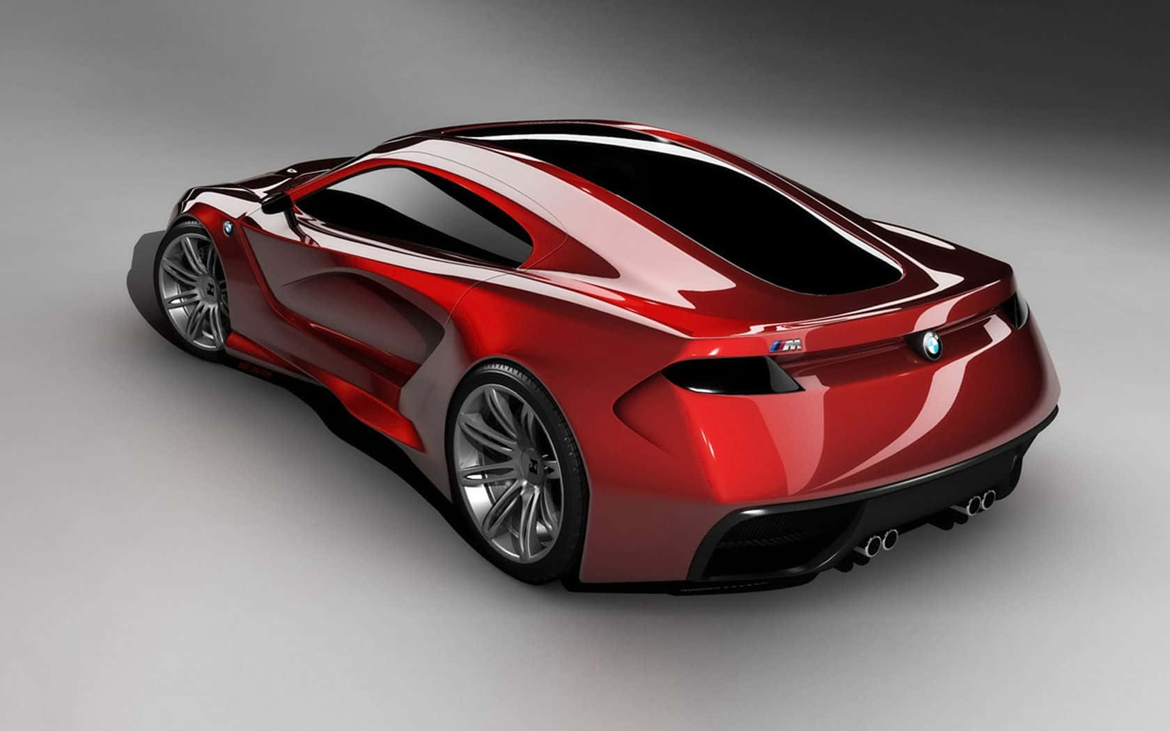 Car Design 桌布 壁紙 — 從後方四分之三角度觀看的時尚紅色BMW概念車，具有光澤飾面和空氣動力學曲線。