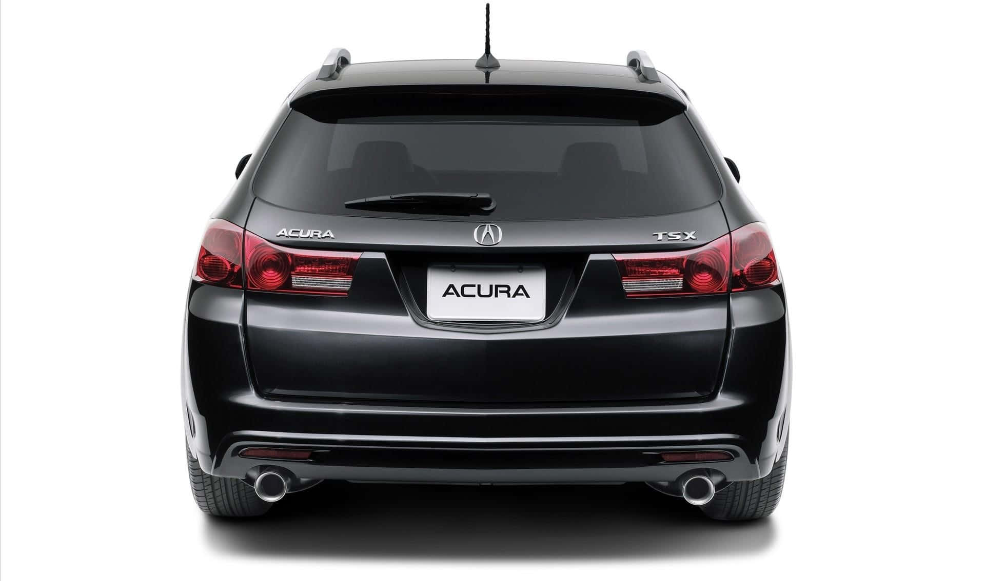 Acura Tsx 桌布 壁紙 — 從後方觀看一輛時尚的黑色Acura TSX旅行車，背景為純白色。