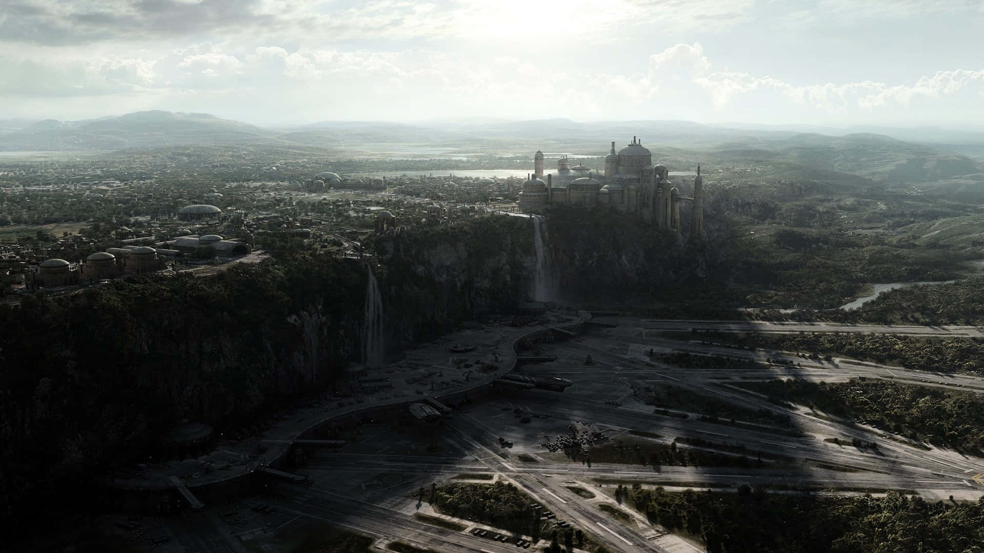 Naboo 桌布 壁紙 — 從懸崖上的宏偉城堡俯瞰廣闊城市和河流的鳥瞰圖，天空多雲。