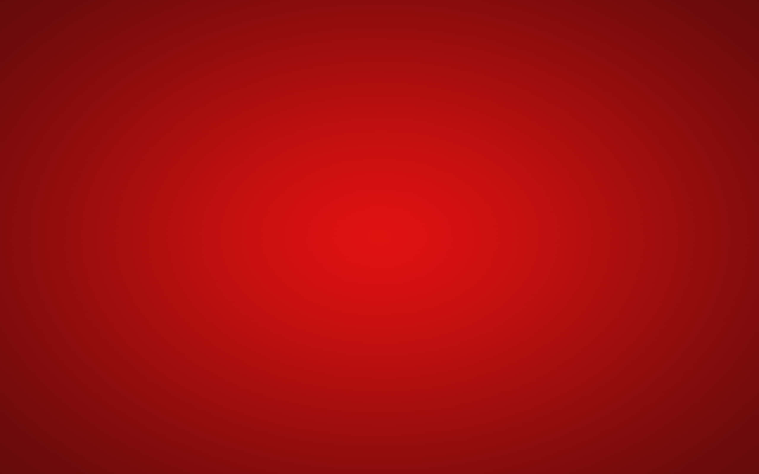Red Light 桌布 壁紙 — 從明亮中心向外漸淡的深紅色平滑漸變，營造出大膽簡約的背景。