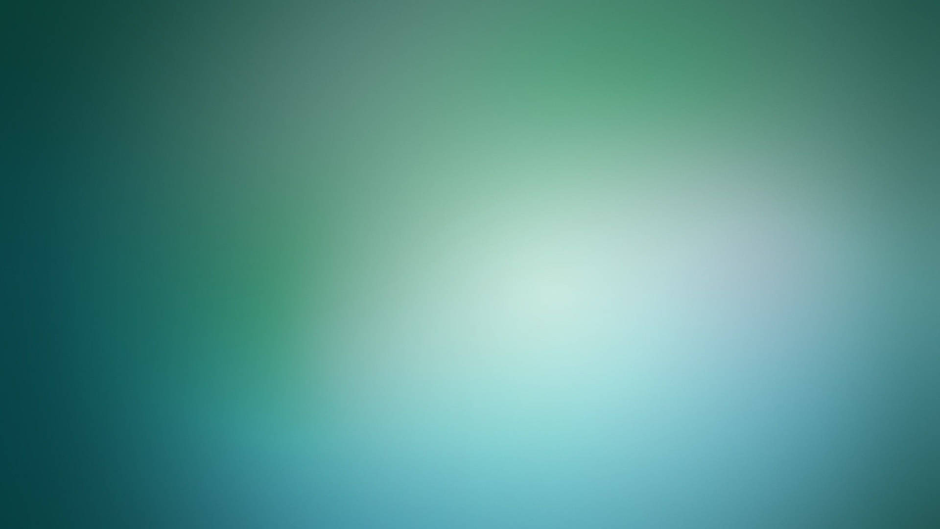 柔和青綠色和藍色漸變背景，中心發光。 — 綠色美學 GIF 壁紙