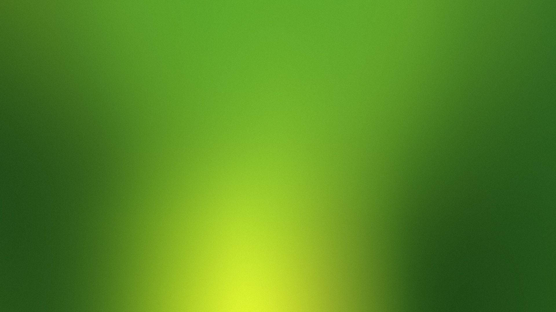 綠色 桌布 壁紙 — 從明亮的黃色中心到較深的綠色邊緣，呈現平滑的綠色漸變。