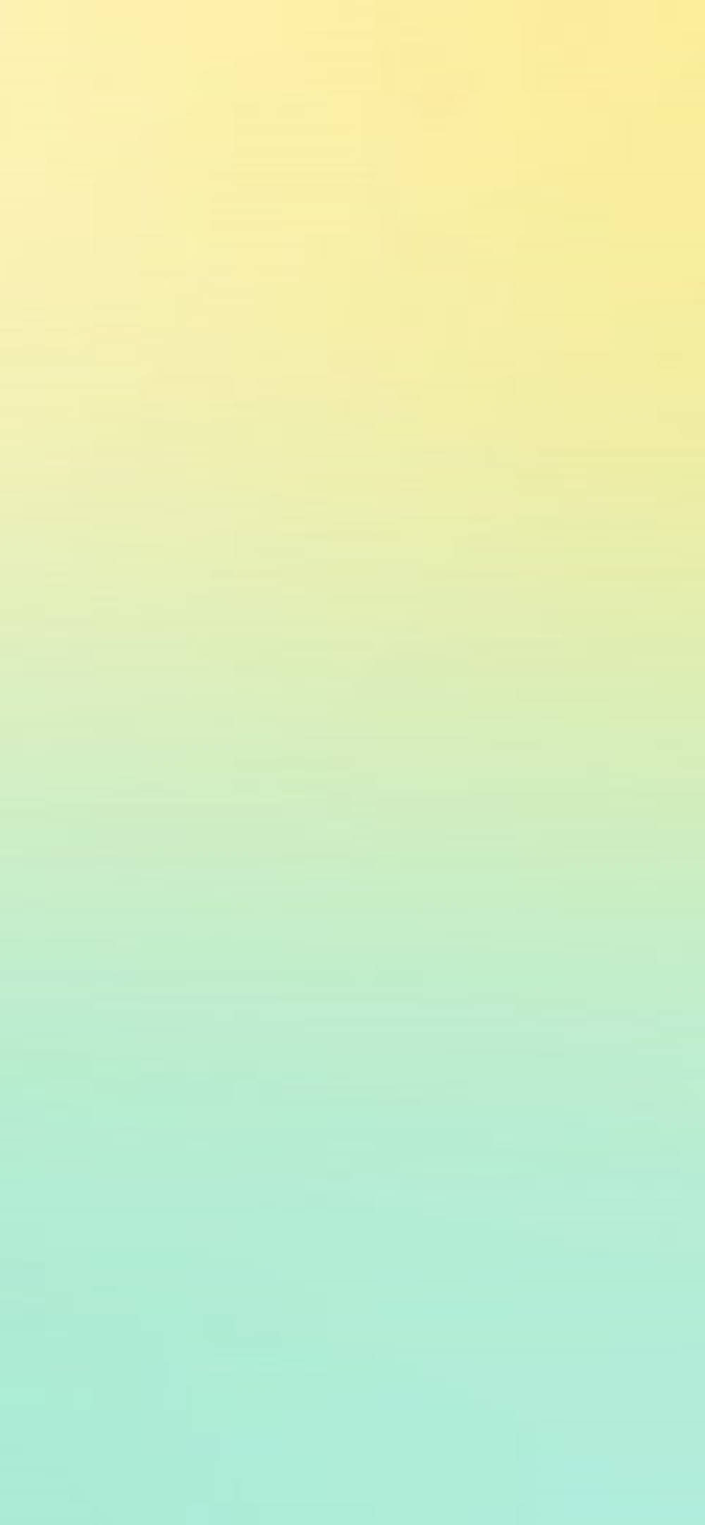 Gradient 桌布 壁紙 — 從柔和黃色到薄荷綠的寧靜垂直漸變，帶有細微紋理。