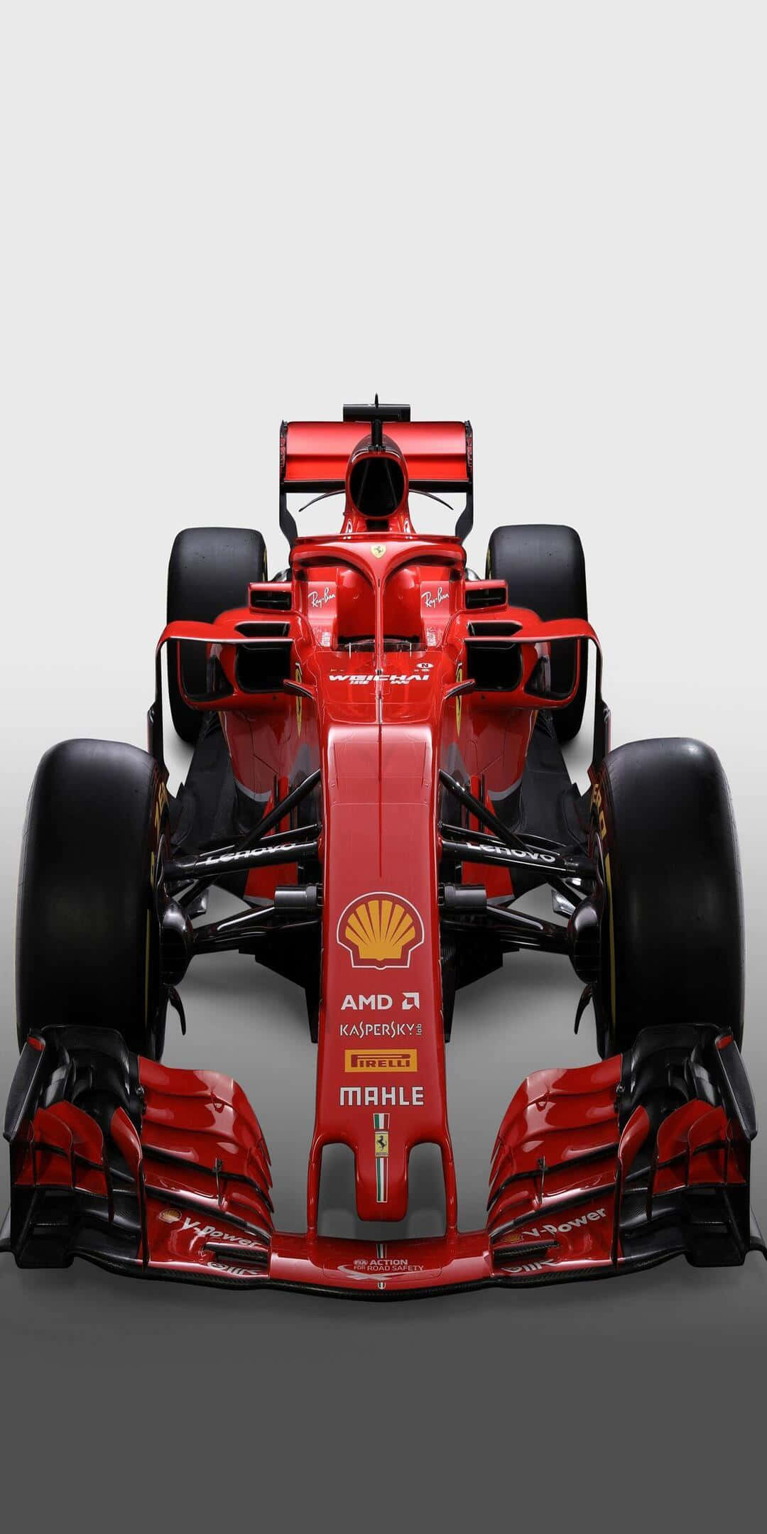 F1 桌布 壁紙 — 從正上方俯瞰一輛流線型紅色一級方程式賽車，背景為簡約灰色。