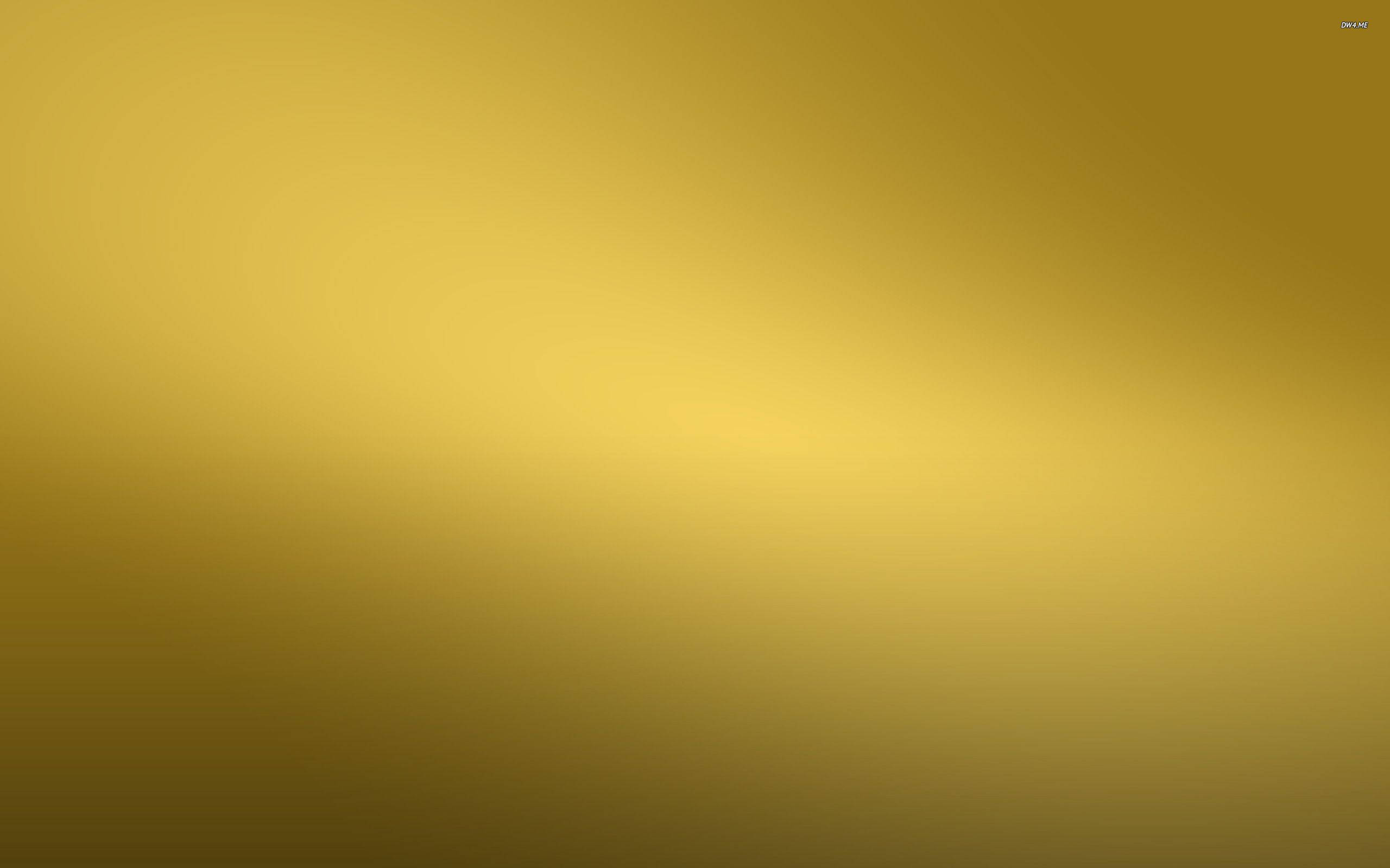 Gold Abstract 桌布 壁紙 — 從深琥珀色過渡到亮黃色的柔和金色漸變。