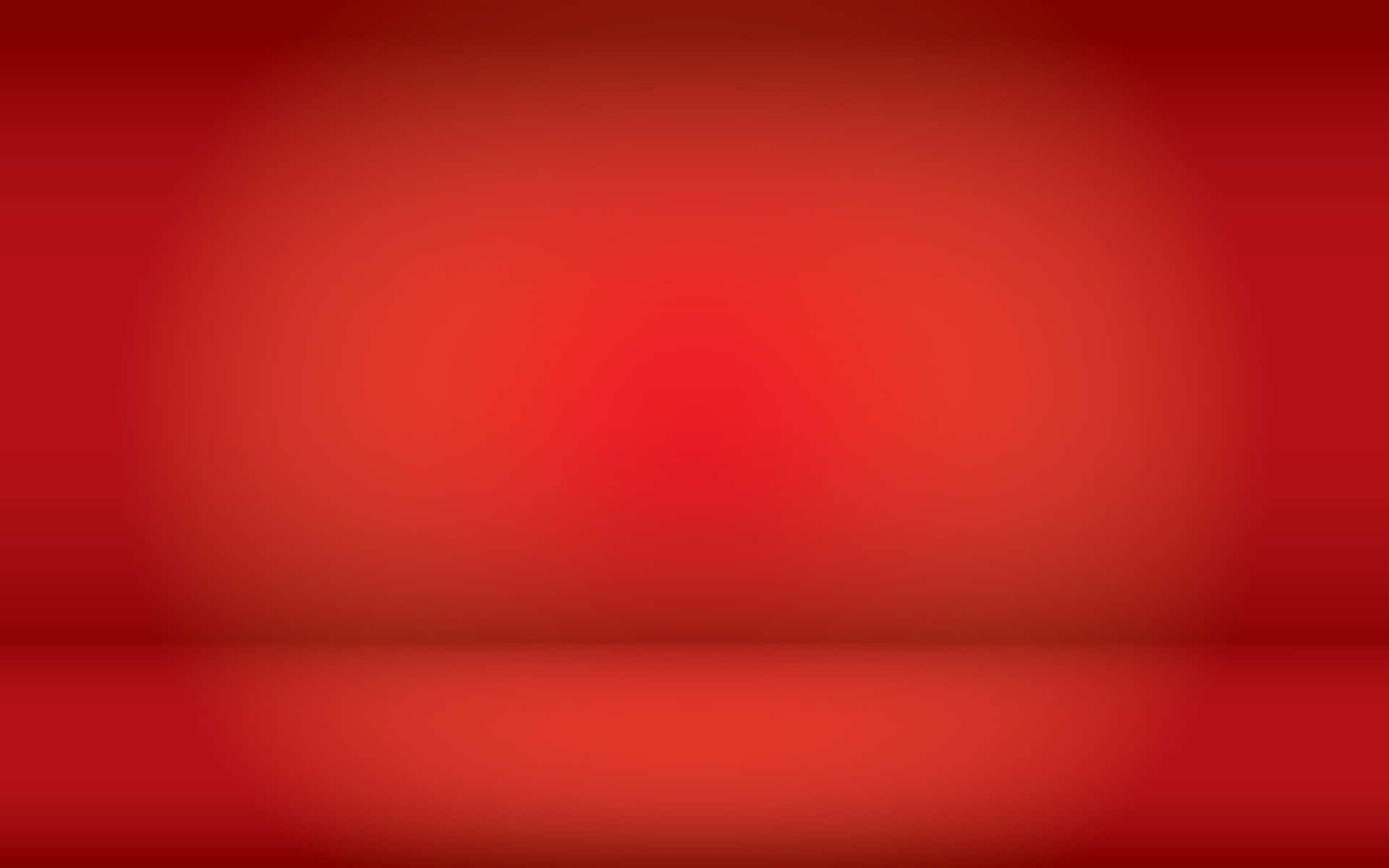 Solid Red 桌布 壁紙 — 從深紅到亮紅的平滑漸變，帶有柔和模糊的邊緣和一條微妙的水平線，營造出極簡工作室背景的感覺。