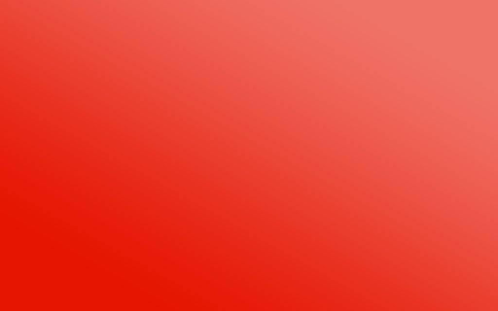 Plain Red 桌布 壁紙 — 從深紅到淺珊瑚色，整個畫面呈現溫暖紅色調的平滑漸變。