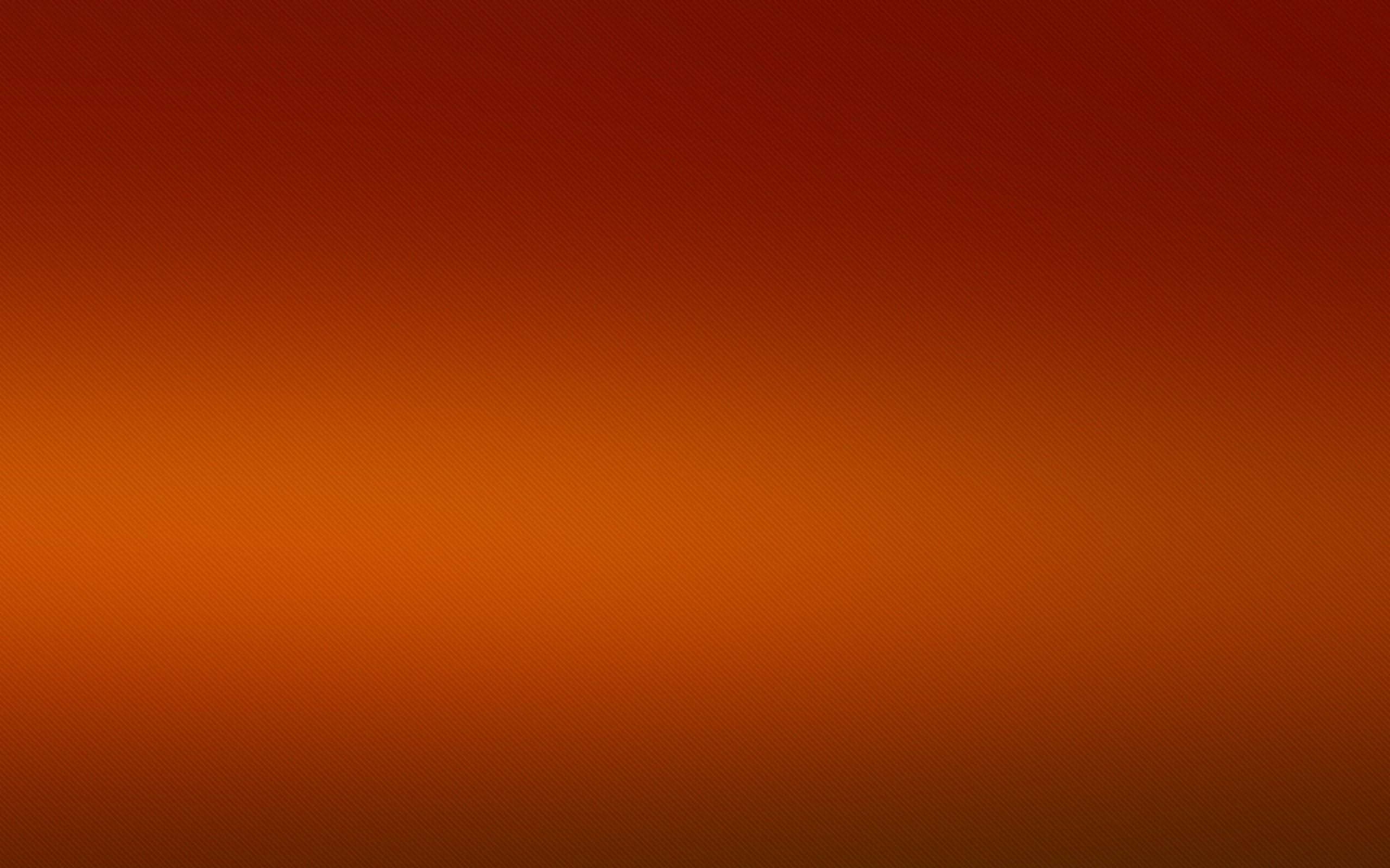 Dark Orange 桌布 壁紙 — 從深紅色到暖橙色的平滑漸變，整個畫面帶有微妙的紋理圖案。