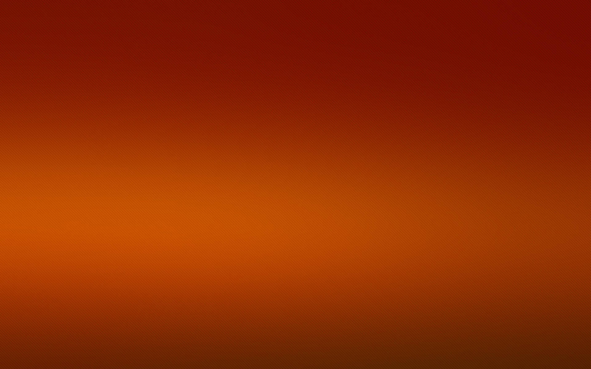 Solid Orange 桌布 壁紙 — 從深紅色到溫暖橙色的平滑漸變，整個畫面帶有微妙的紋理圖案。