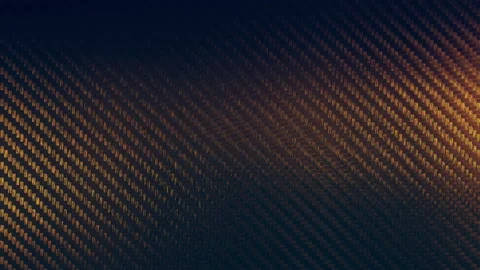 抽象碳纖維紋理，帶有藍色到金色的漸變照明。 — 碳纖維 壁紙
