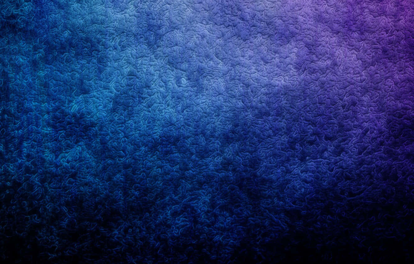 Purple Texture 桌布 壁紙 — 從深藍到紫色的紋理漸變，帶有類似宇宙星雲或抽象布料的漩渦圖案。