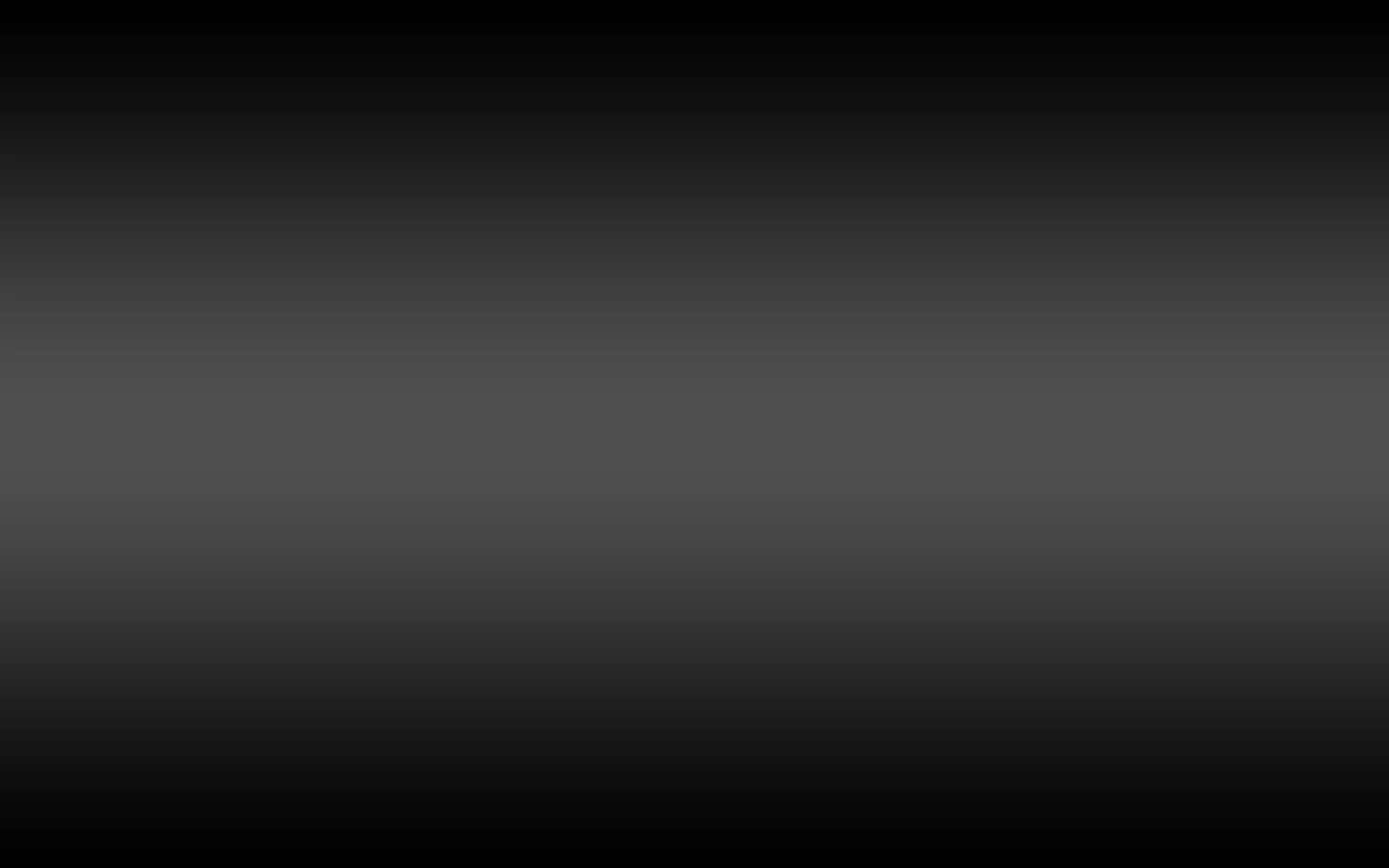 Black Gradient 桌布 壁紙 — 從深黑色到柔和灰色的極簡漸變桌布，跨越平滑的水平區域。