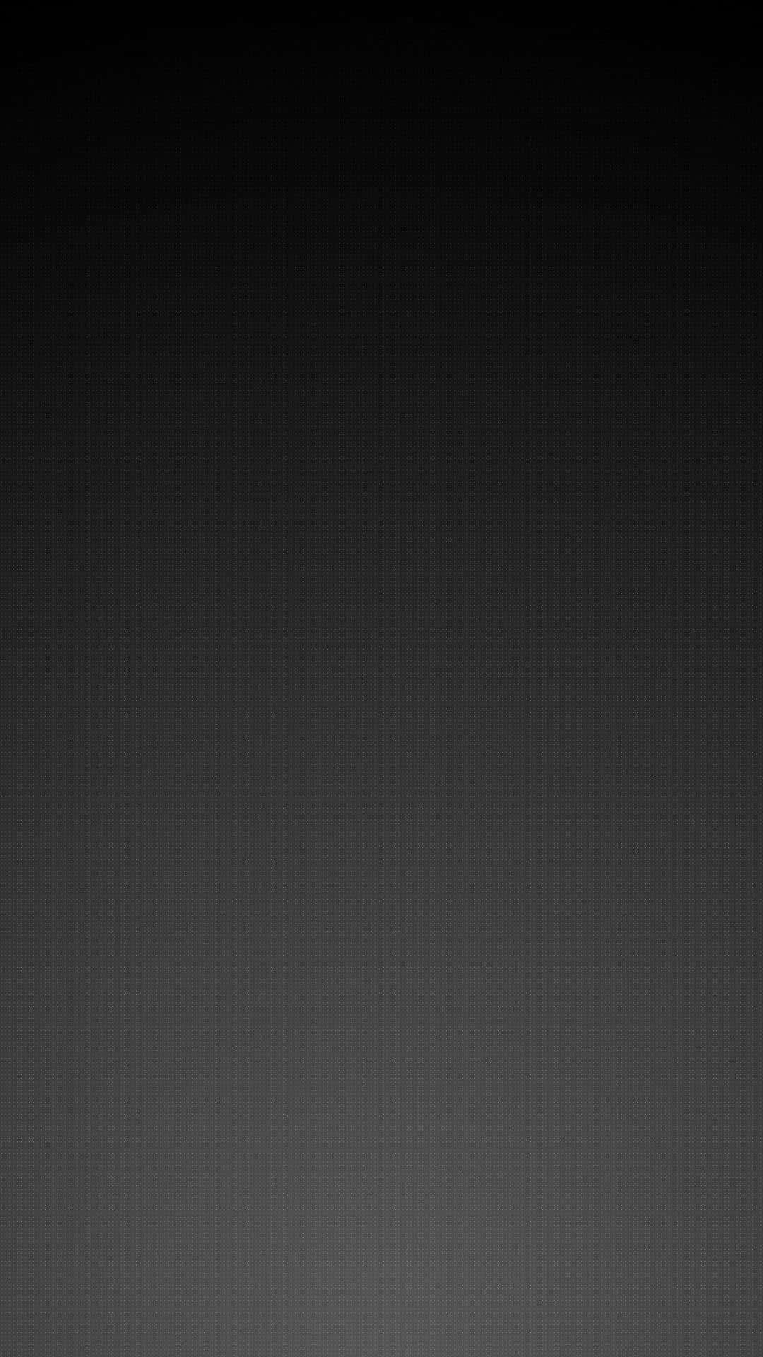 Dark Gray 桌布 壁紙 — 從深黑色過渡到炭灰色的極簡漸變桌布，帶有微妙的像素紋理。
