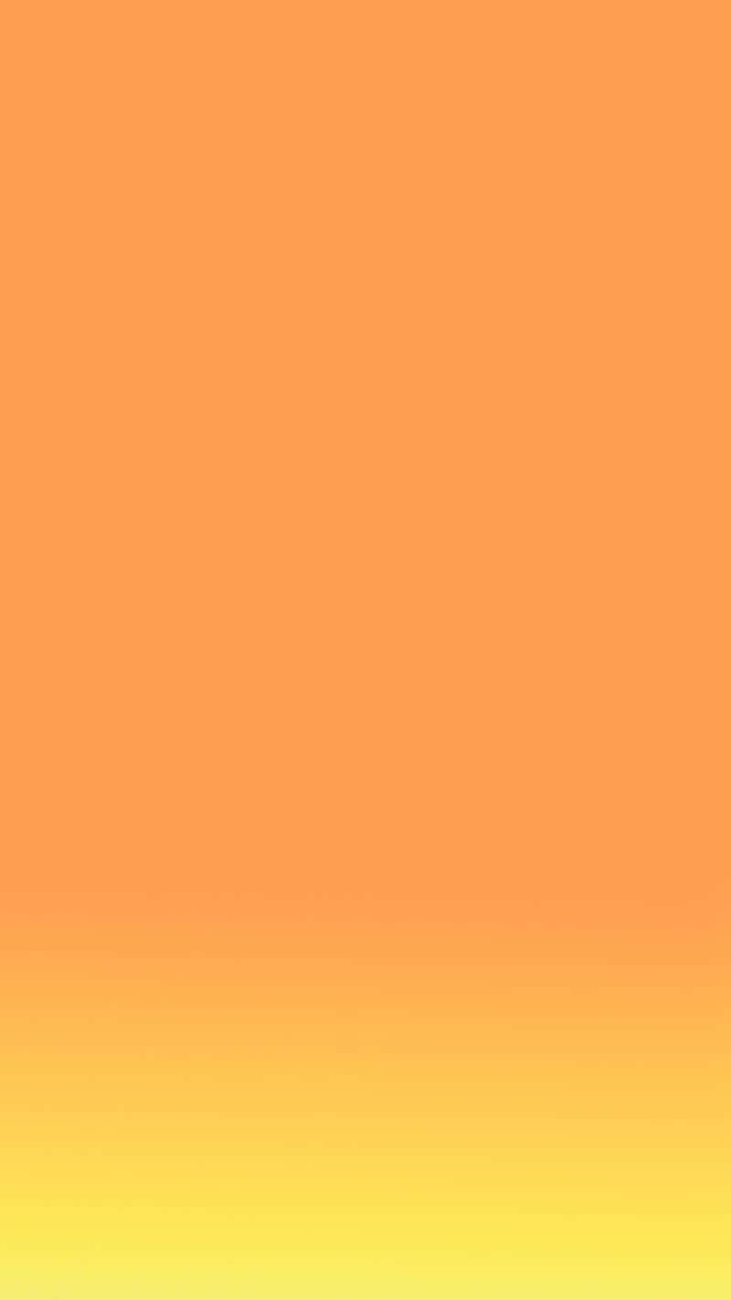 Orange Gradient 桌布 壁紙 — 從溫暖的橙色到明亮的黃色平滑過渡，營造出寧靜的極簡背景。