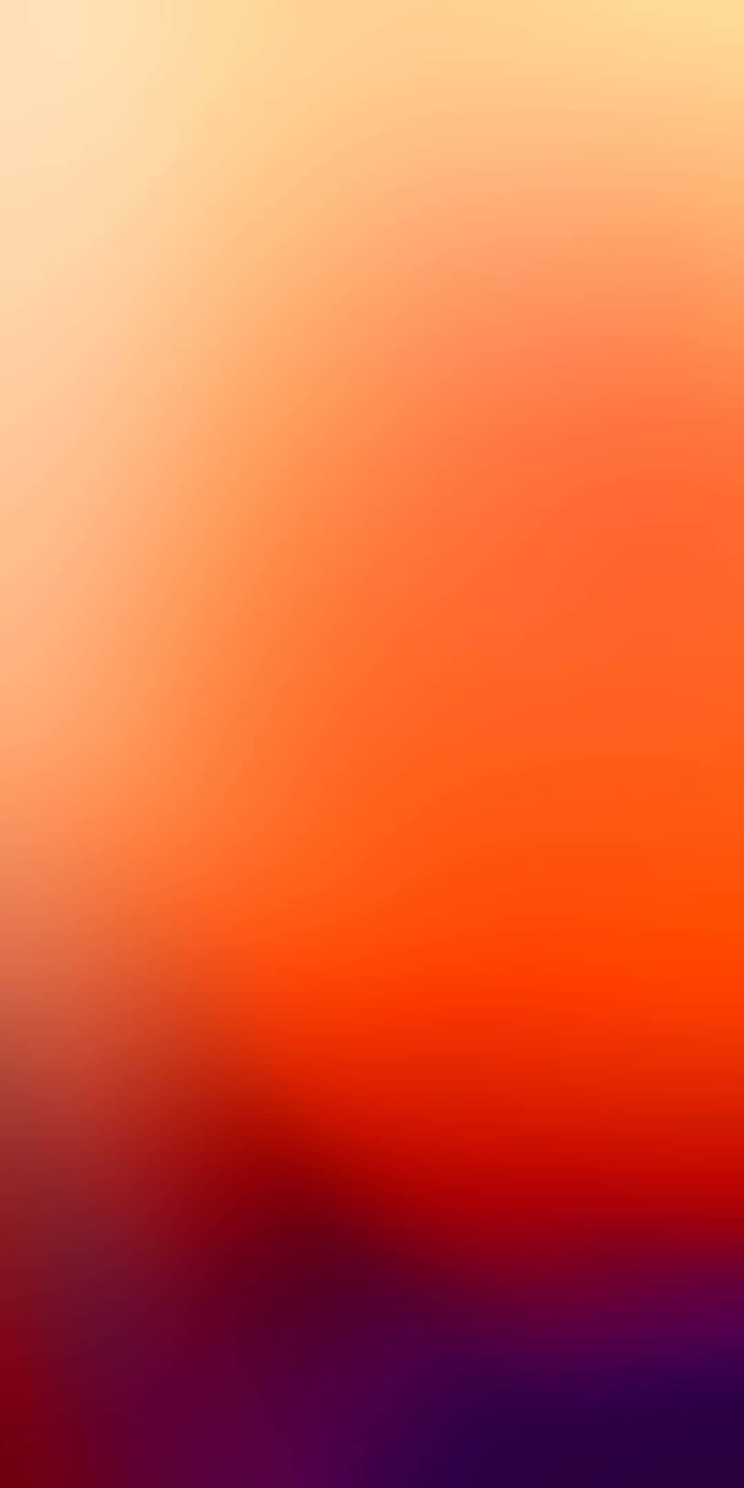 Orange Gradient 桌布 壁紙 — 從溫暖黃色到火熱橙色再到底部深紫色的平滑漸變。