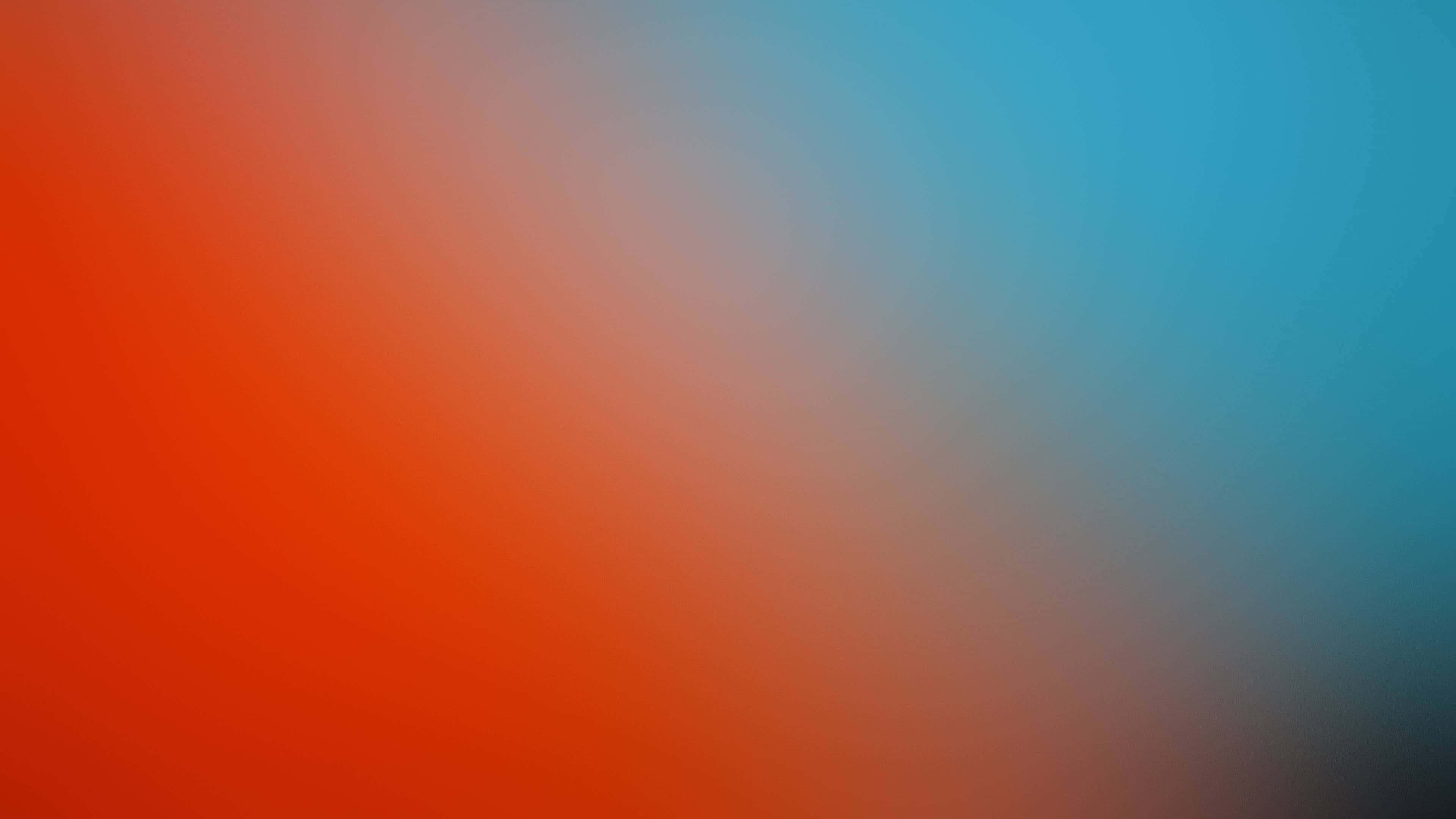 Orange Gradient 桌布 壁紙 — 從火熱的橙色到清涼的青色平滑過渡，中間柔和融合。