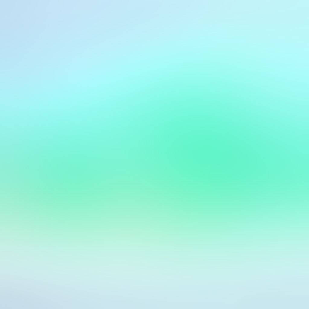 Gradient 桌布 壁紙 — 從粉藍色到薄荷綠的柔和漸變，營造出帶有細膩紋理的平靜抽象背景。