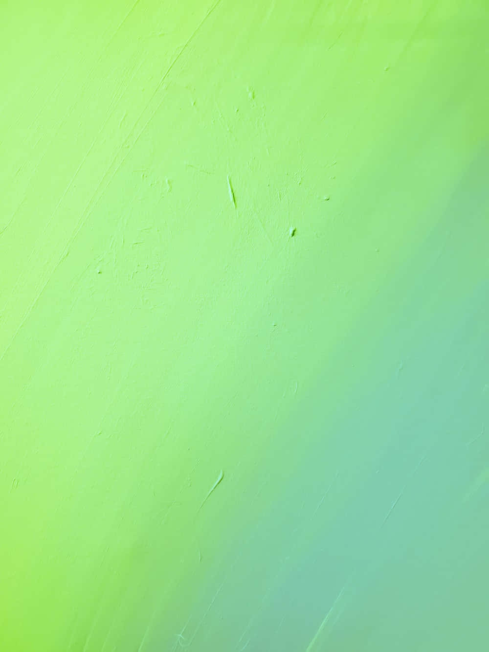 漸層 桌布 壁紙 — 從萊姆綠色到藍綠色的鮮豔漸變，表面帶有細微的筆觸紋理和淡淡的刮痕。