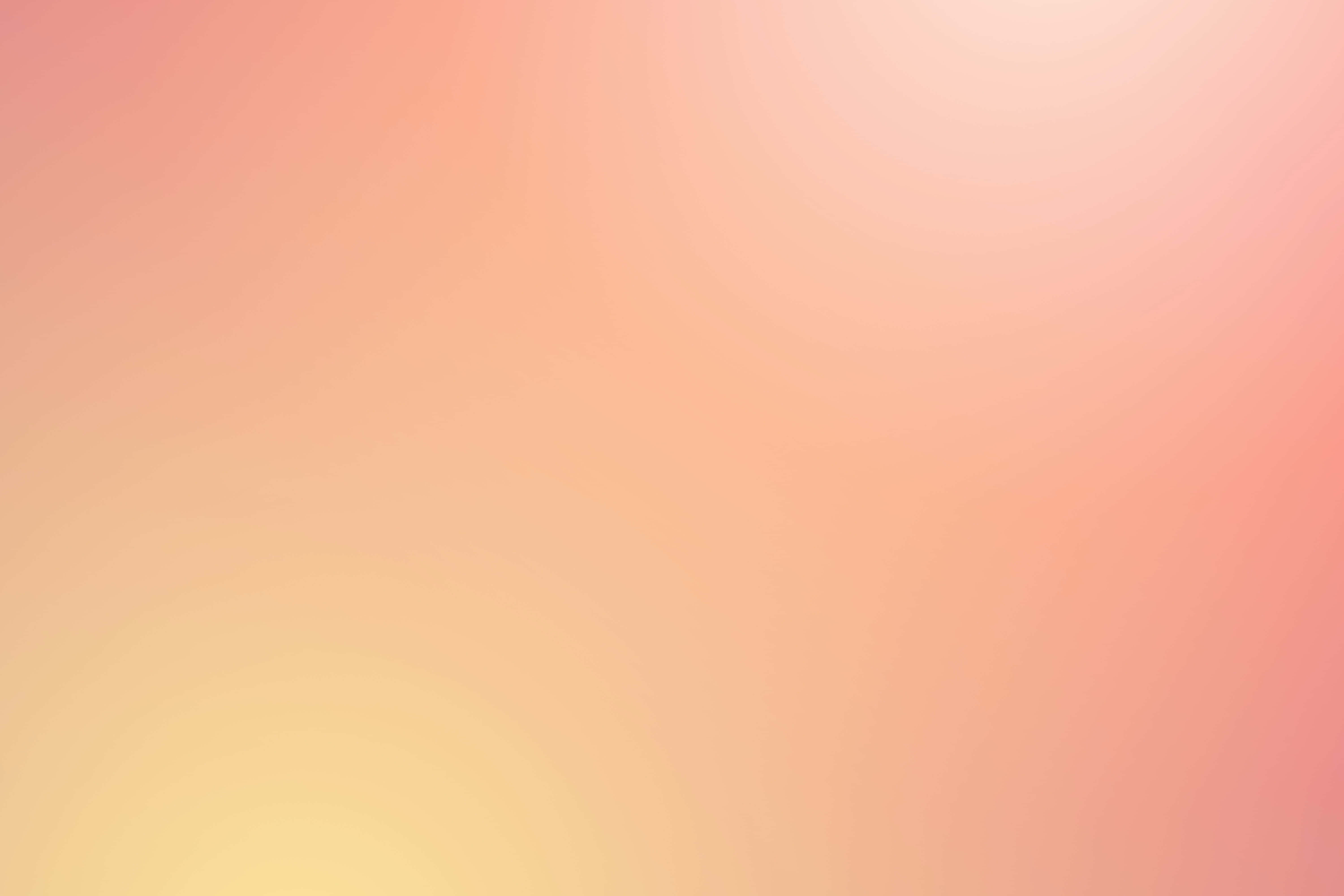 Orange Gradient 桌布 壁紙 — 從蜜桃粉到暖黃色的柔和漸變，營造出平靜的抽象背景。