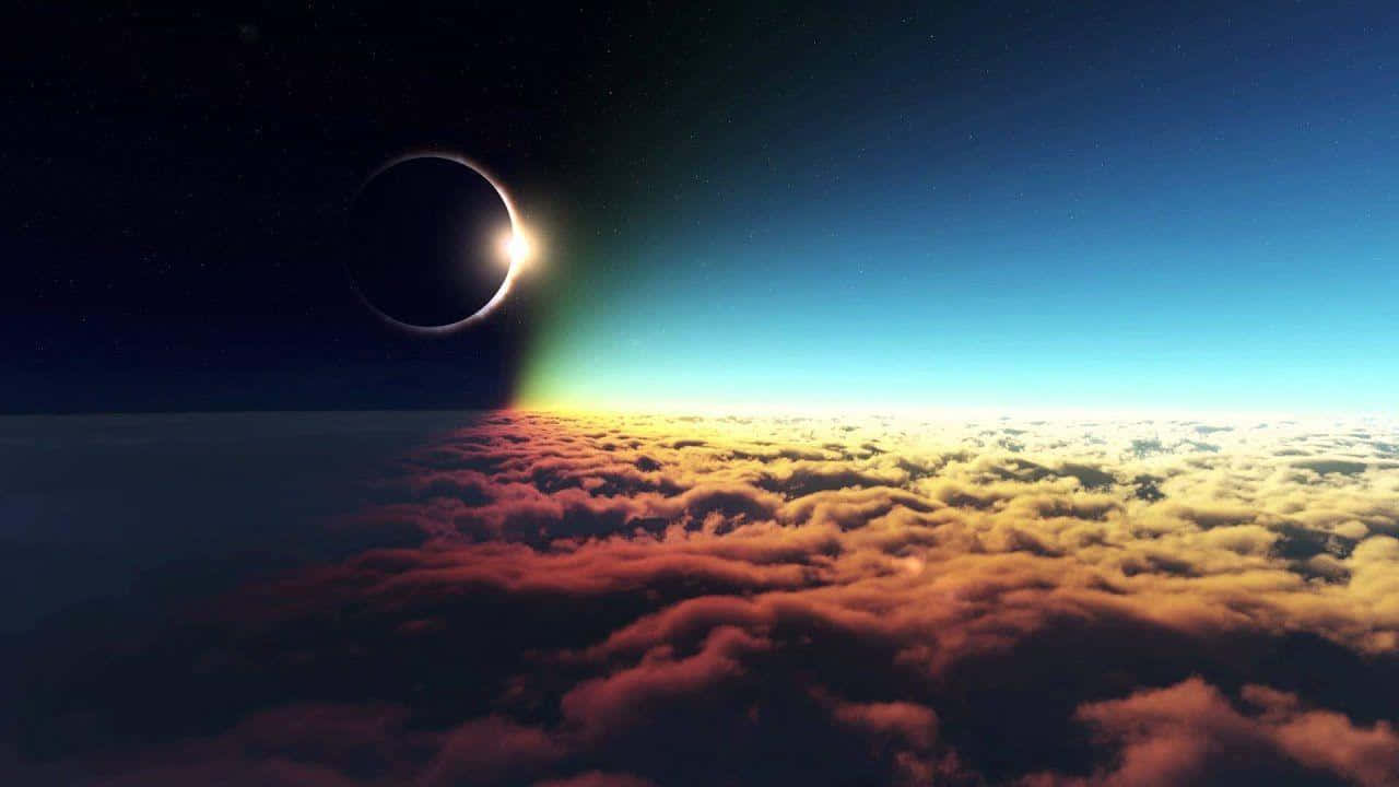 Eclipse 桌布 壁紙 — 從雲層上方觀看的壯麗日蝕，將金色光芒灑向天空。