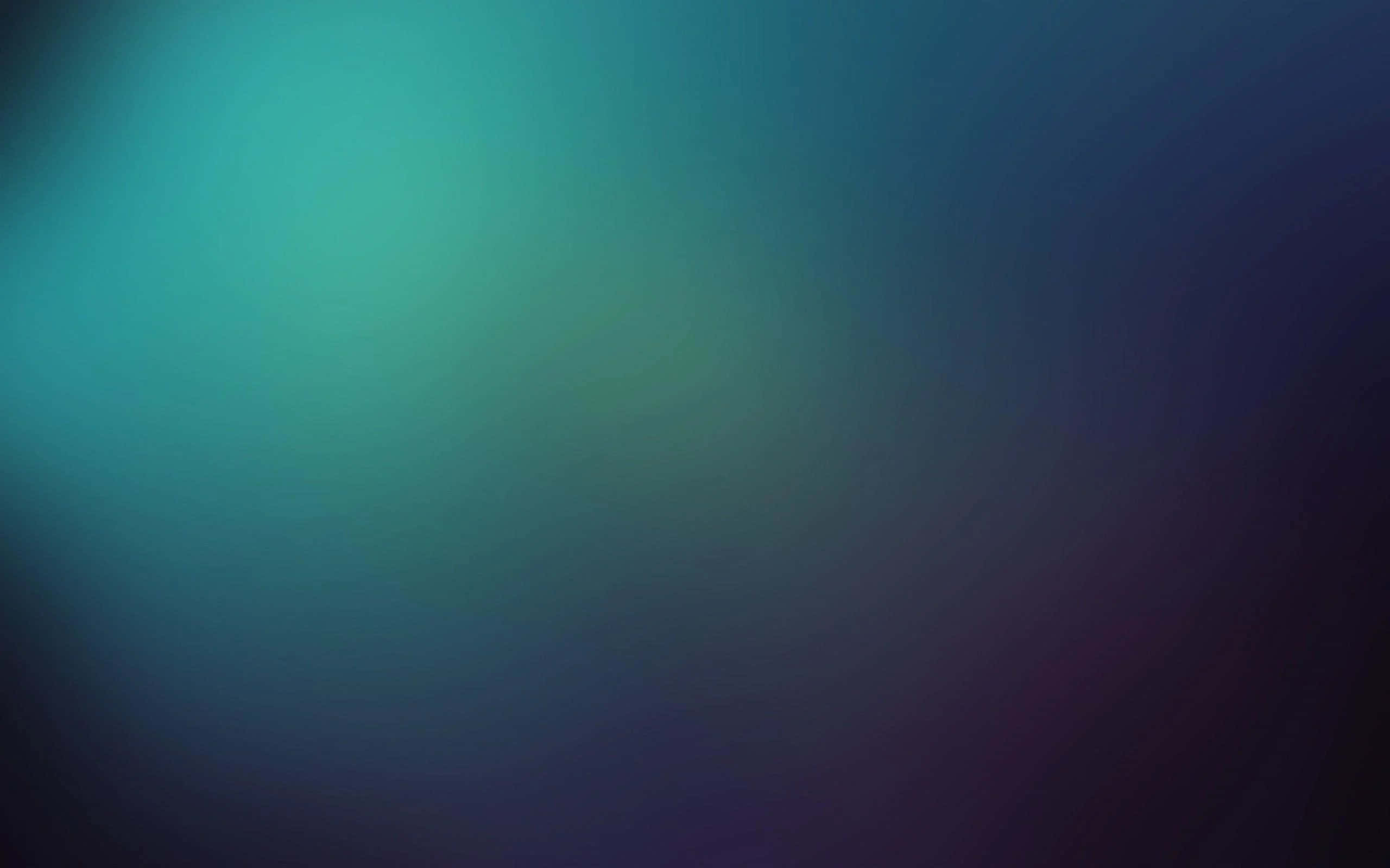 Gradient Blue 桌布 壁紙 — 從青綠色到深紫色的平滑漸變，營造出平靜的抽象背景。