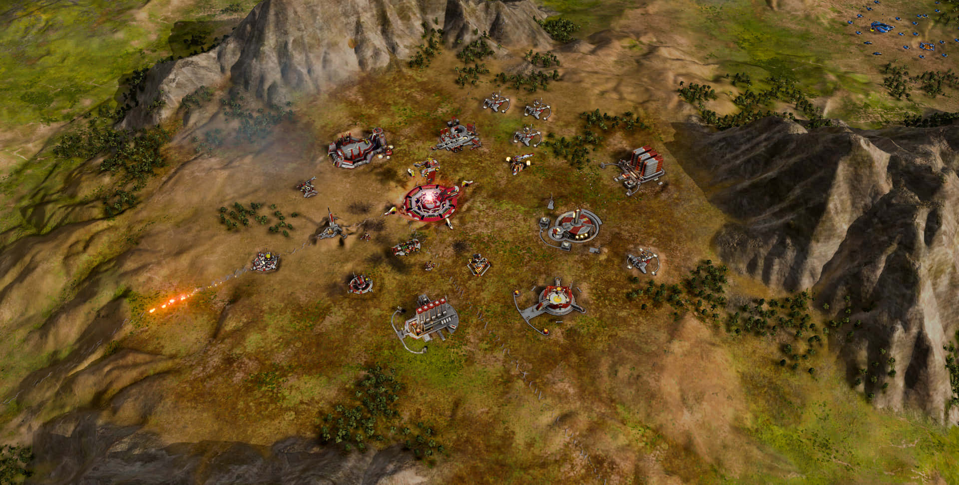 Ashes Of The Singularity Escalation 桌布 壁紙 — 從高空俯瞰未來科幻基地和車輛在崎嶇山區地形上交戰的景象。