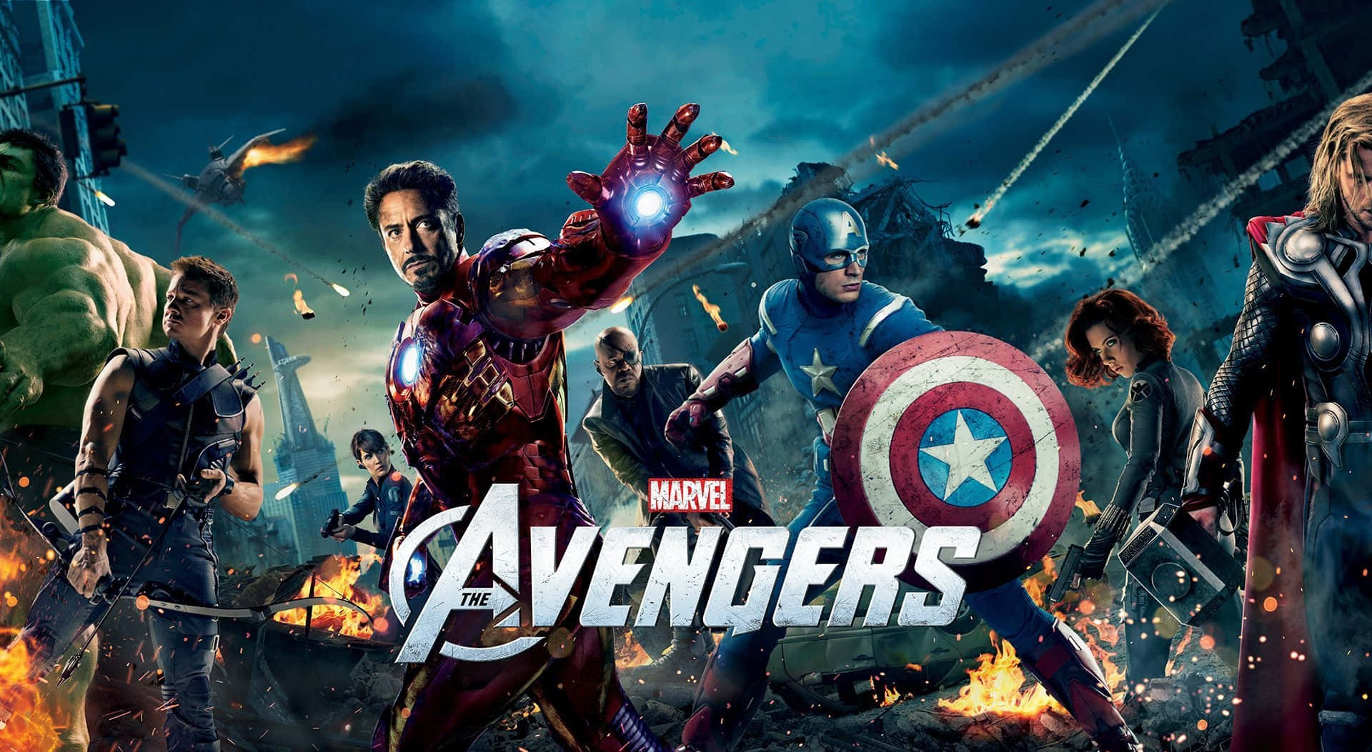Marvel Movie 桌布 壁紙 — 復仇者聯盟的英雄們在風暴天空下，於熾熱爆炸和崩塌的城市廢墟中戰鬥。