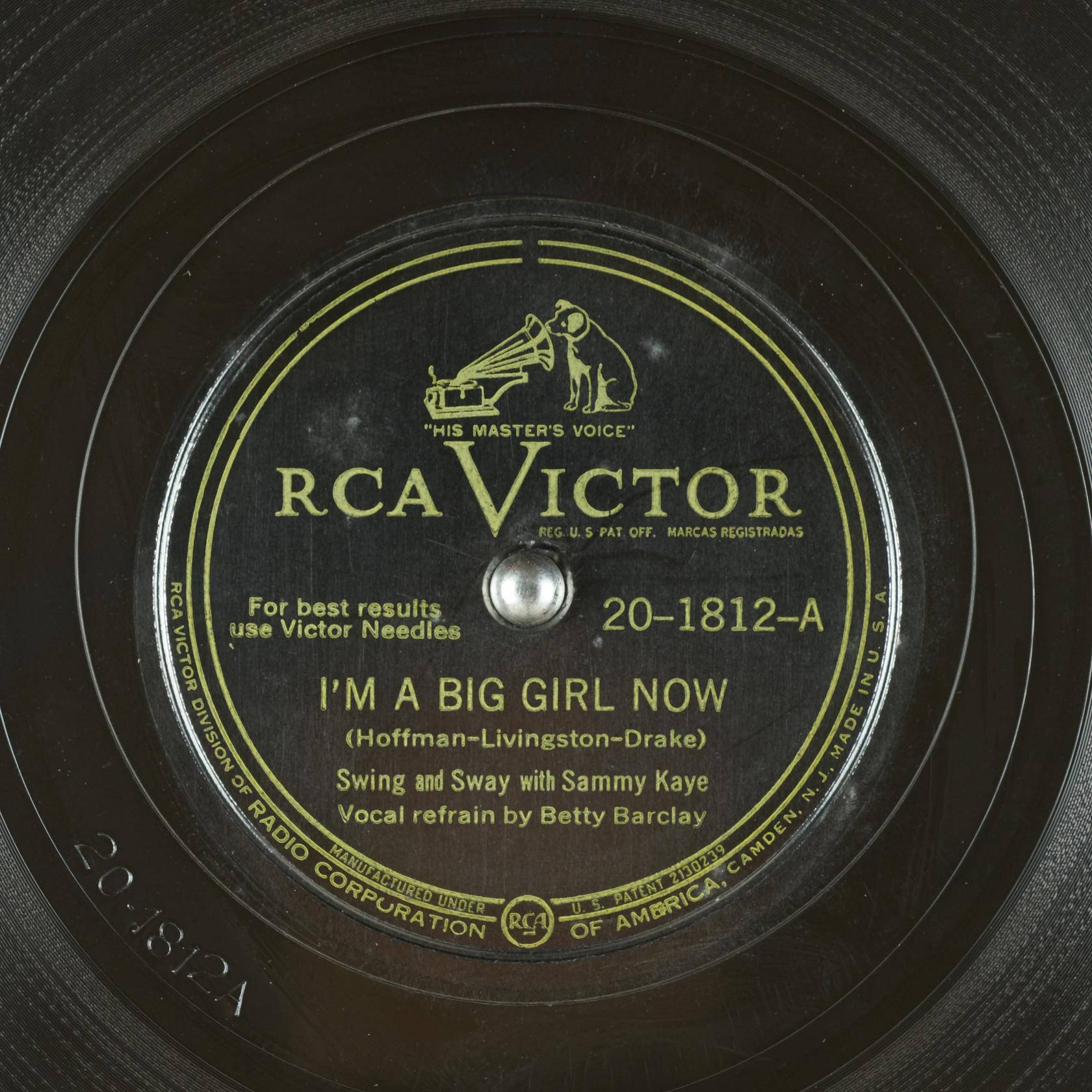 vinyl 桌布 壁紙 — 復古RCA Victor 78rpm唱片標籤特寫，金色文字和His Master's Voice標誌。