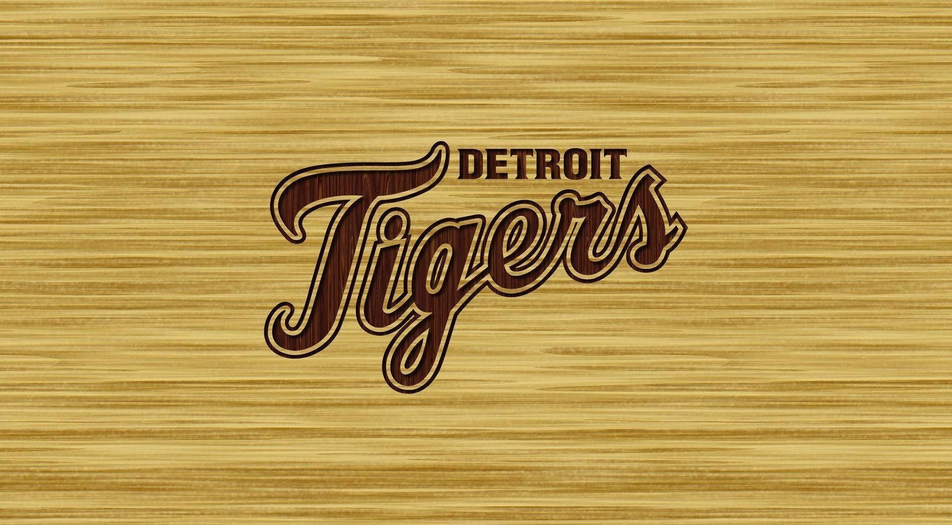 tigers 桌布 壁紙 — 復古底特律老虎隊標誌以粗體字呈現於有紋理的木質背景上，搭配溫暖的金色調。