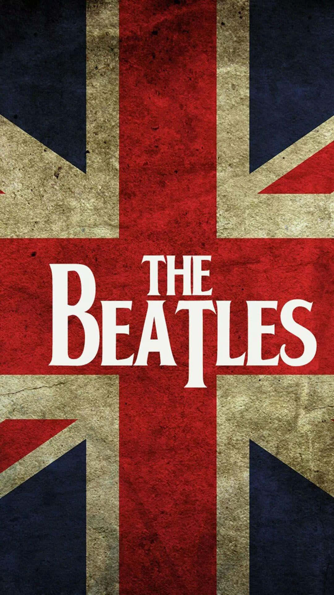 the beatles 桌布 壁紙 — 復古紋理 Union Jack 旗幟，中央突出顯示粗體白色文字 The Beatles。