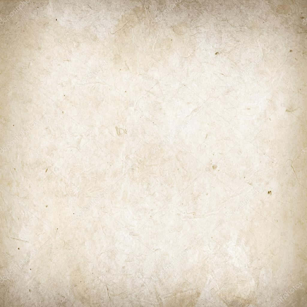 Old Paper 桌布 壁紙 — 復古羊皮紙，帶有暖米色調的細微摺痕和斑點。