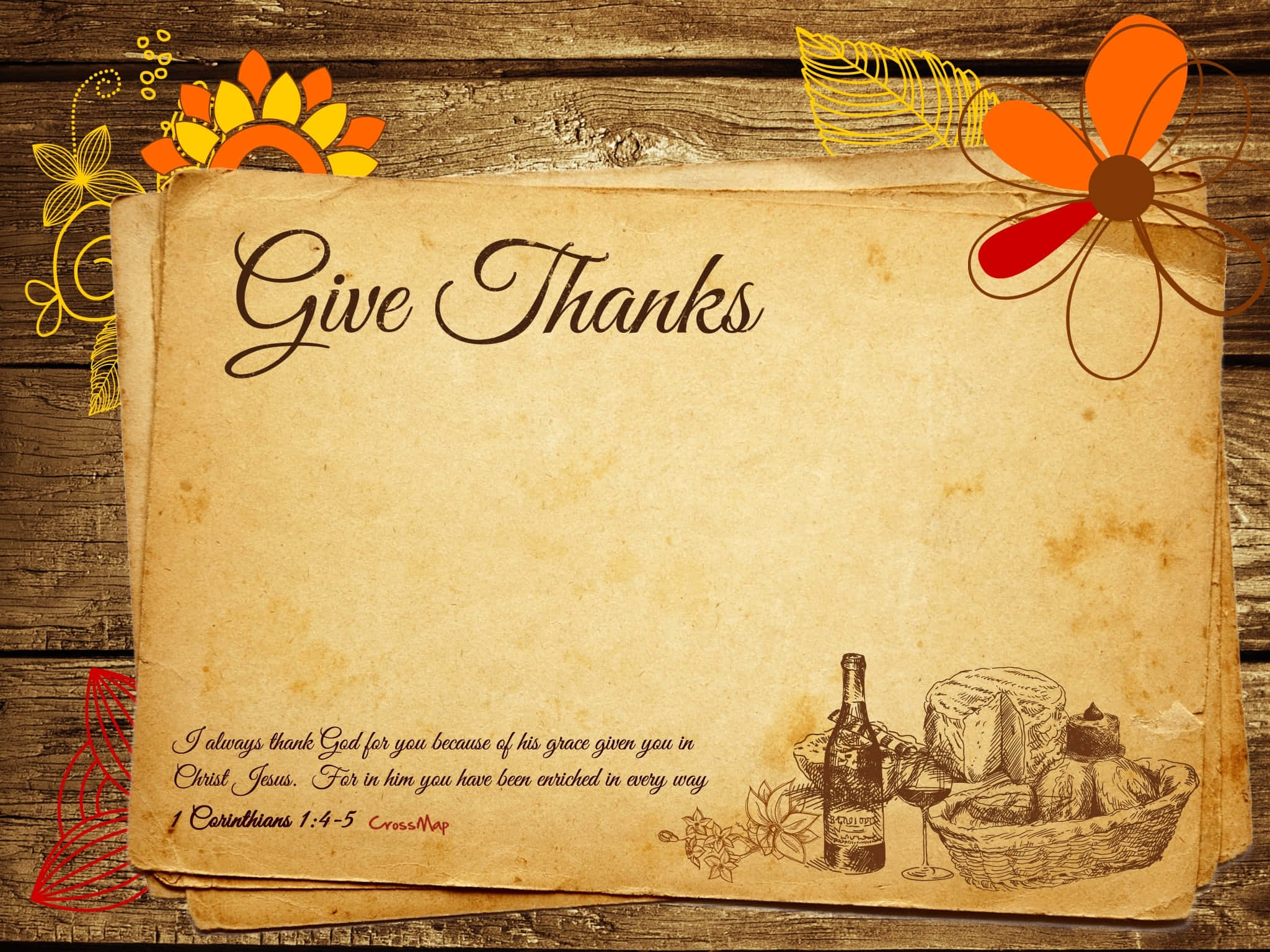 節日 桌布 壁紙 — 復古羊皮紙上寫有「Give Thanks」字樣，置於風化木頭上，飾以彩色紙花及一籃葡萄酒和起司。