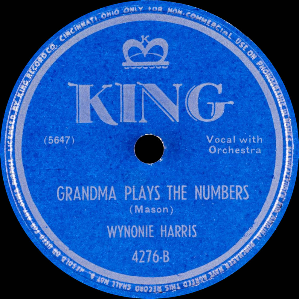 vinyl 桌布 壁紙 — 復古藍色King Records標籤，白色文字和皇冠標誌，黑色背景。