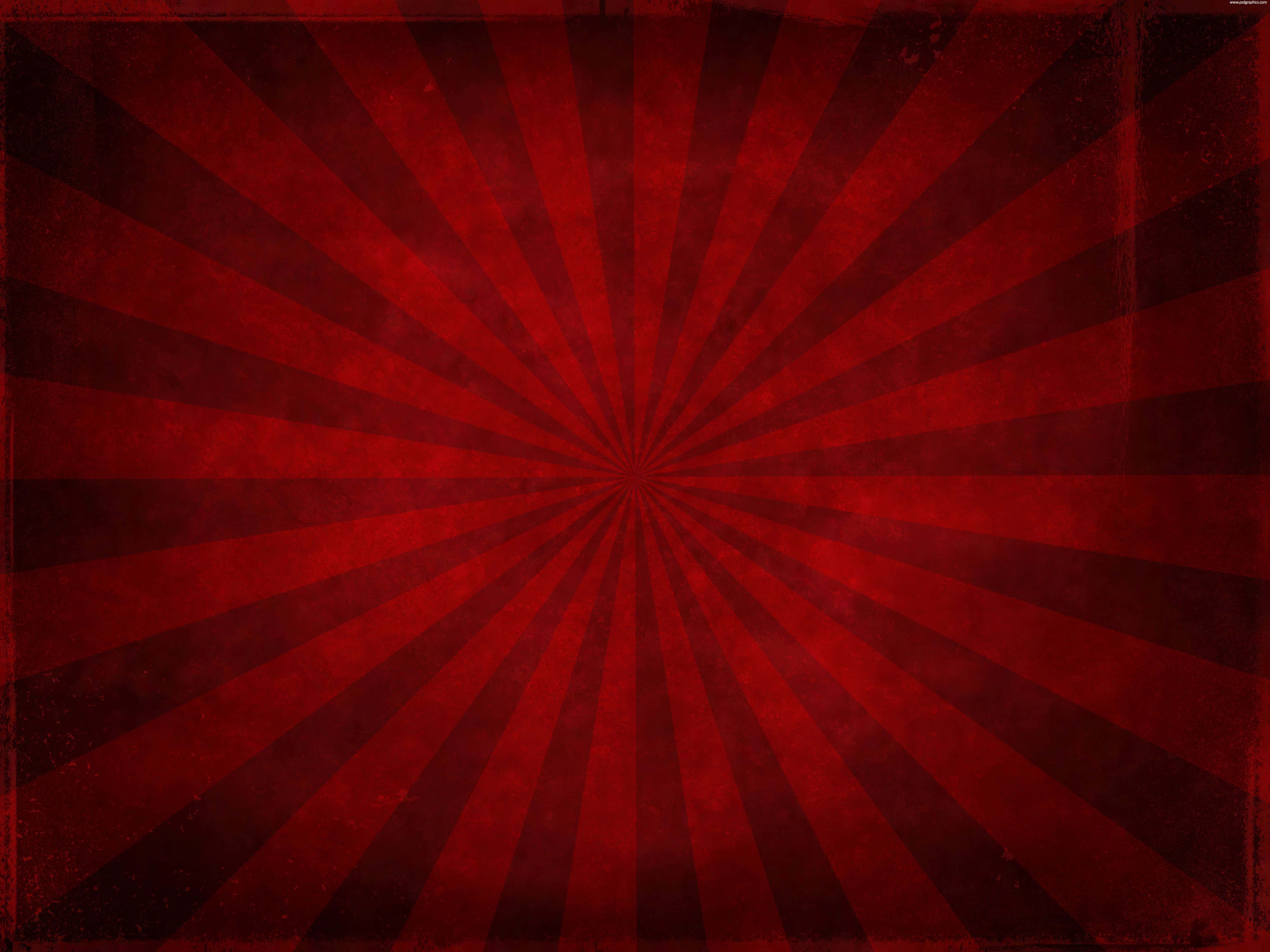 Red Grunge 桌布 壁紙 — 復古風格紅色放射狀爆發壁紙，帶有磨損紋理和褪色邊緣。
