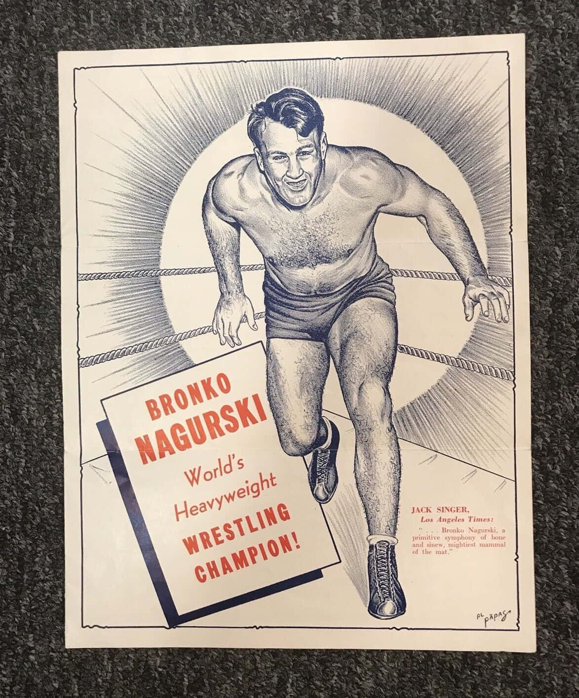 Champion 桌布 壁紙 — 復古黑白插圖，描繪摔角手 Bronko Nagurski 在擂台上，粗體紅色文字宣佈他為世界重量級冠軍。