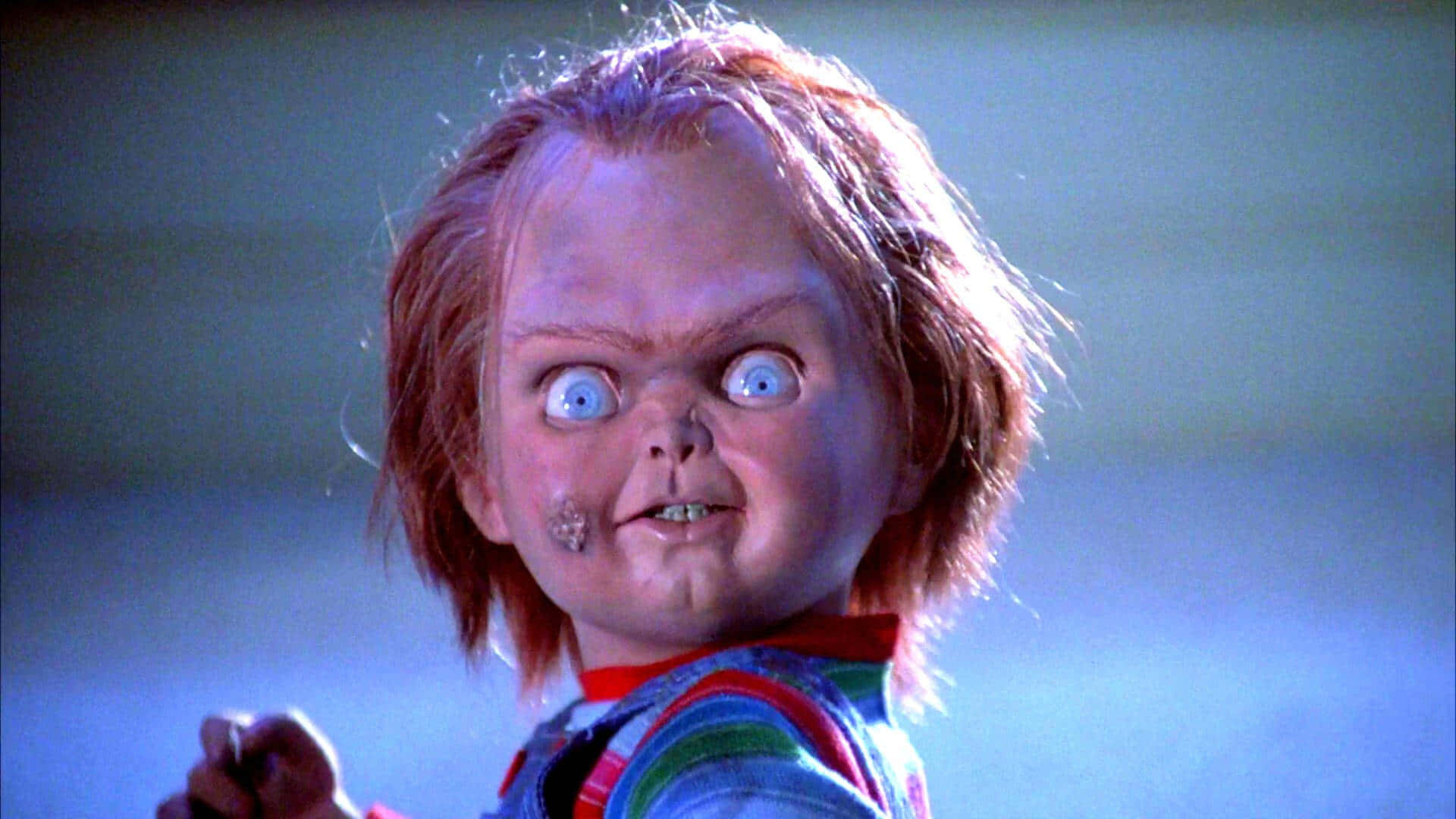 恐怖娃娃Chucky，大眼睛和紅髮。 — 恐怖電影 壁紙