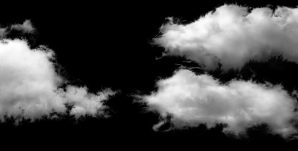 雲朵 桌布 壁紙 — 戲劇性的白雲在漆黑的天空中飄移，呈現高對比度的單色效果。