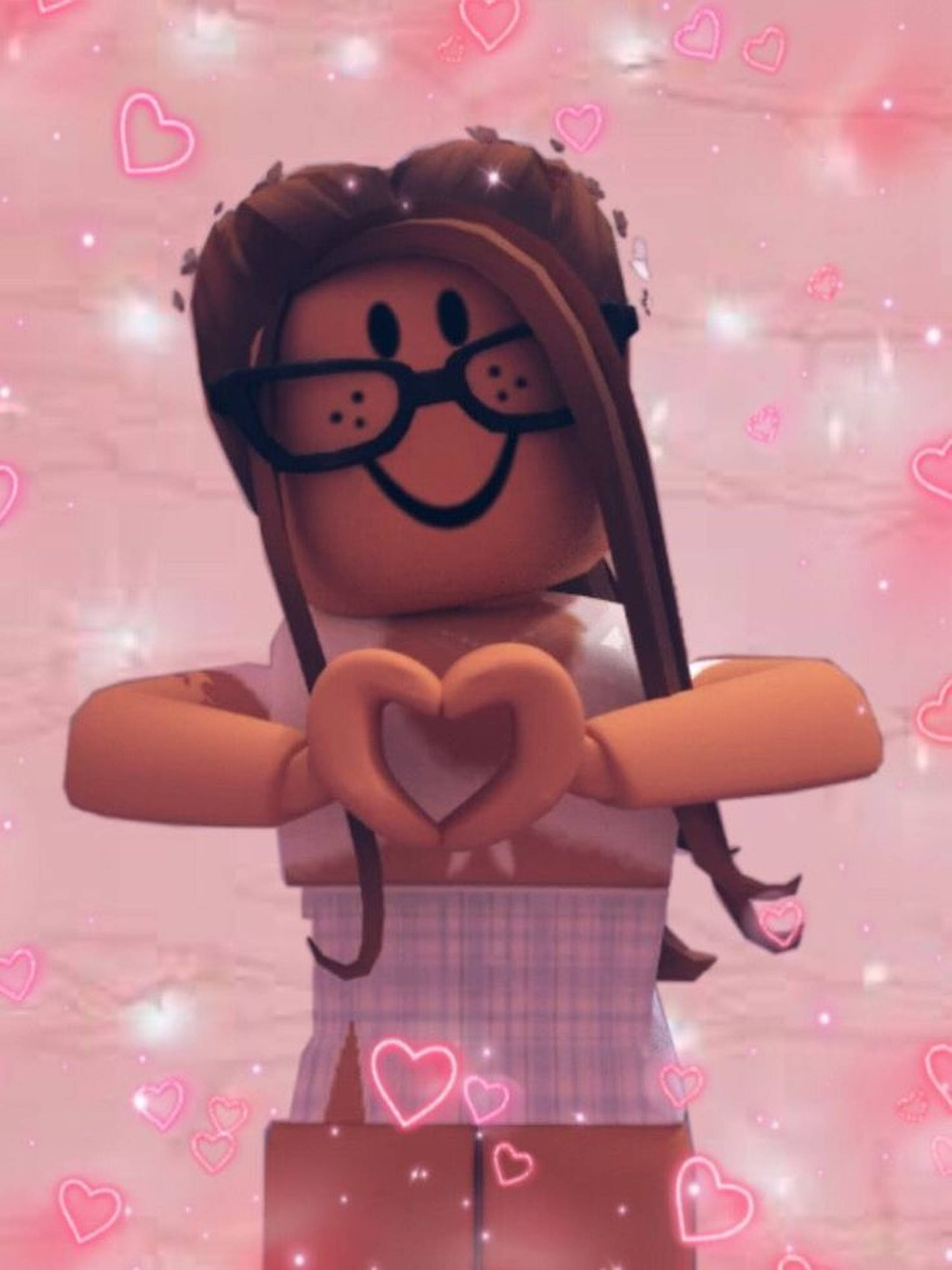 Roblox Girl 桌布 壁紙 — 戴眼鏡的 Roblox 頭像在閃爍的粉紅色背景前用雙臂形成心形，背景充滿漂浮的心形。