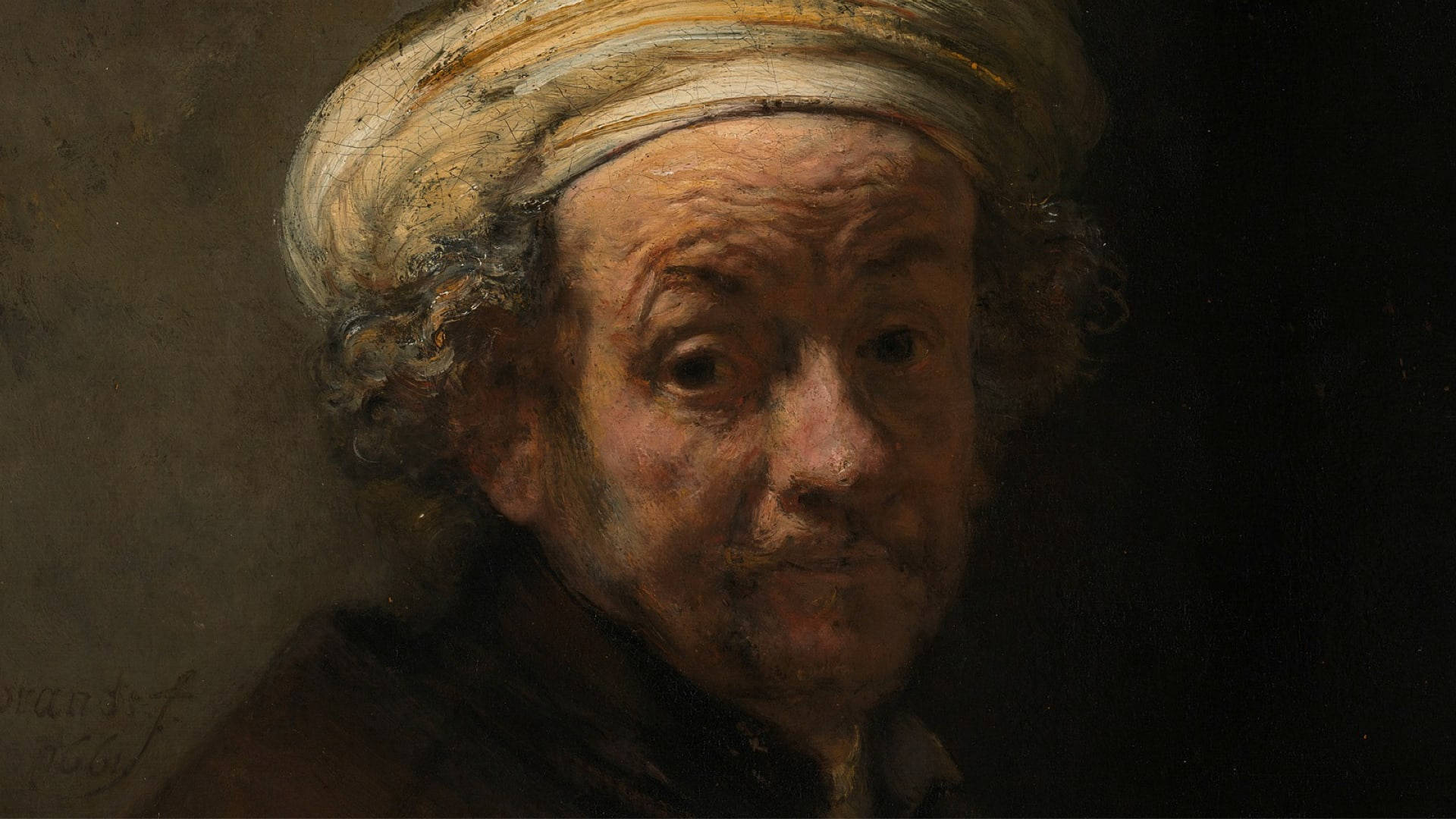 Rembrandt 桌布 壁紙 — 戴頭巾長者的特寫肖像，在戲劇性的明暗對比燈光下，深皺紋格外突出。