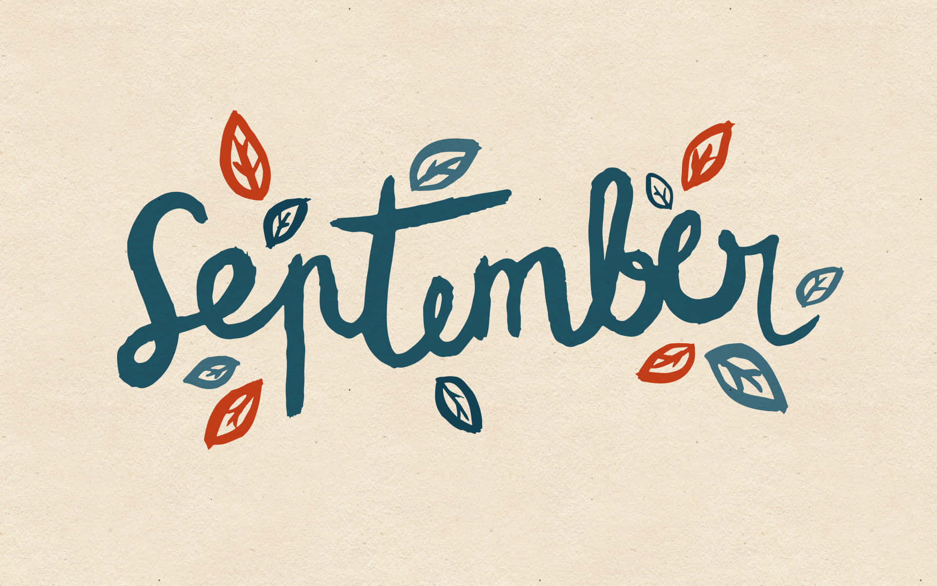 September 桌布 壁紙 — 手寫的九月，以藍綠色字體書寫，周圍環繞著紅色和藍綠色的葉子，位於有紋理的奶油色紙上。