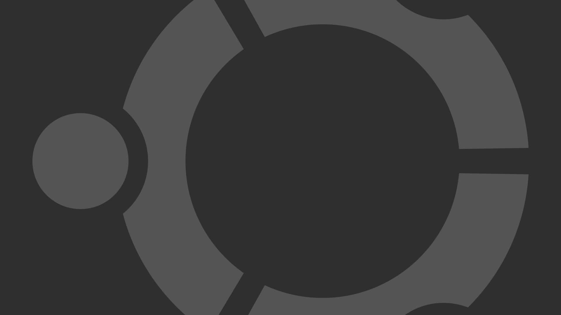 ubuntu 桌布 壁紙 — 抽象幾何圖案，由深色背景上不同灰色調的重疊圓形和弧線組成。