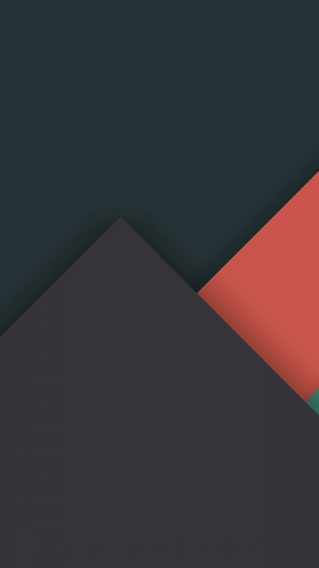 Minimalist Pattern 桌布 壁紙 — 抽象幾何圖案壁紙，以深海軍藍背景襯托大膽的深灰色和珊瑚紅色三角形形狀。