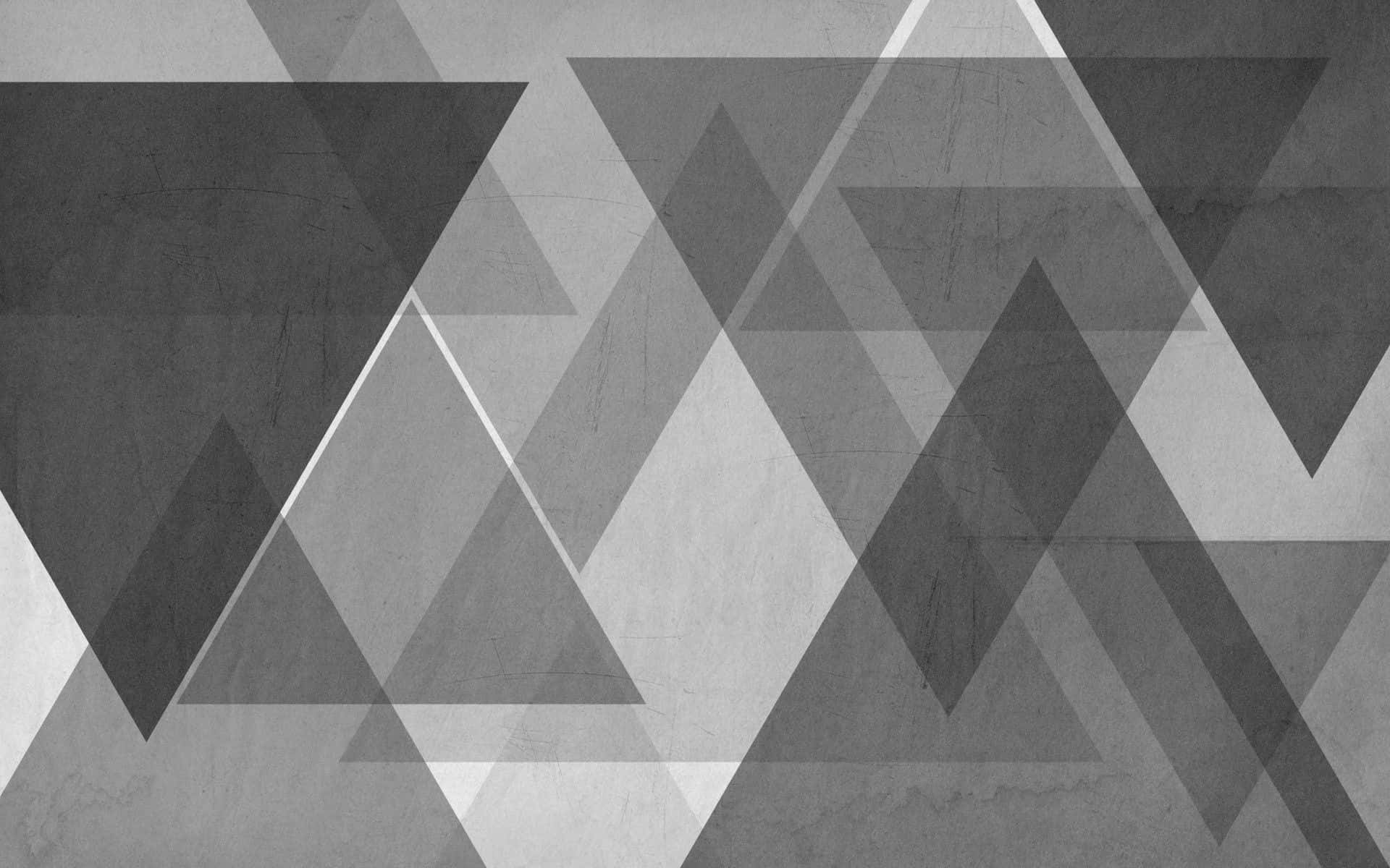Grey Texture 桌布 壁紙 — 抽象幾何壁紙，在紋理背景上以灰階色調呈現重疊三角形。