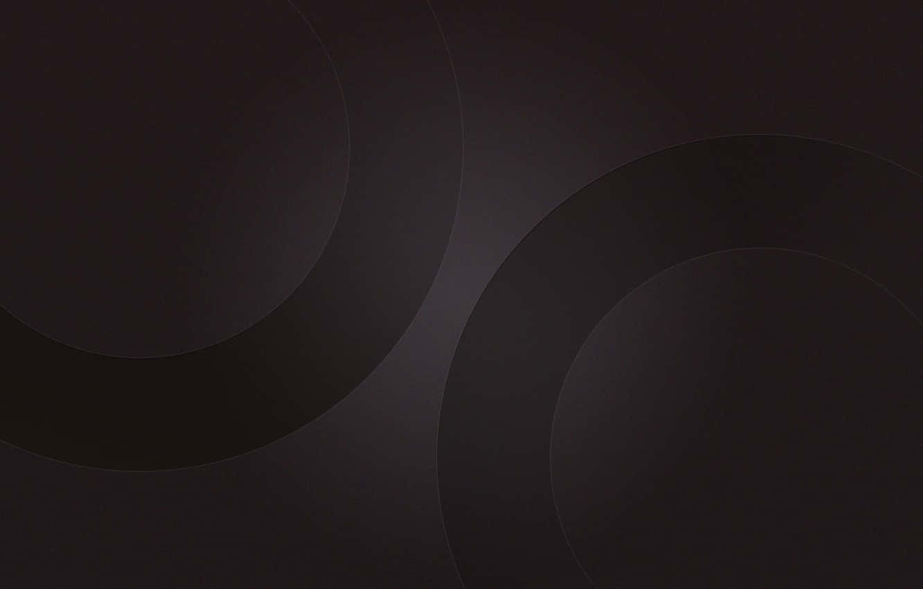 Dark Circles 桌布 壁紙 — 抽象深色桌布，帶有柔和漸變圓圈，營造簡約寧靜的視覺質感。