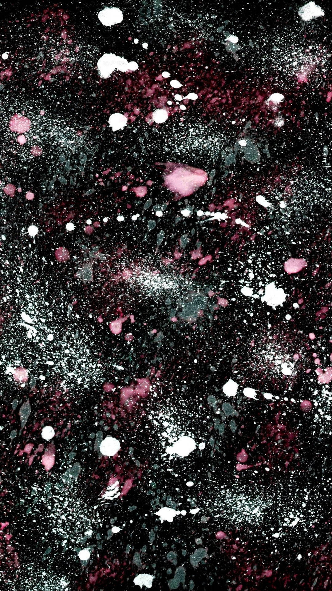 Splatter Paint 桌布 壁紙 — 抽象深色背景，濺上充滿活力的粉紅色、白色和灰色油漆滴，營造出宇宙或銀河效果。