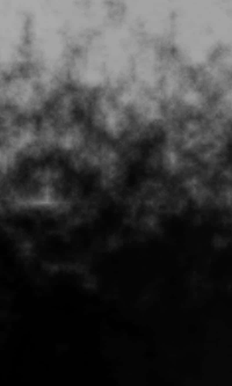 Black Gradient 桌布 壁紙 — 抽象灰階紋理，帶有煙霧漸變和柔和模糊形態，營造神秘氛圍效果。