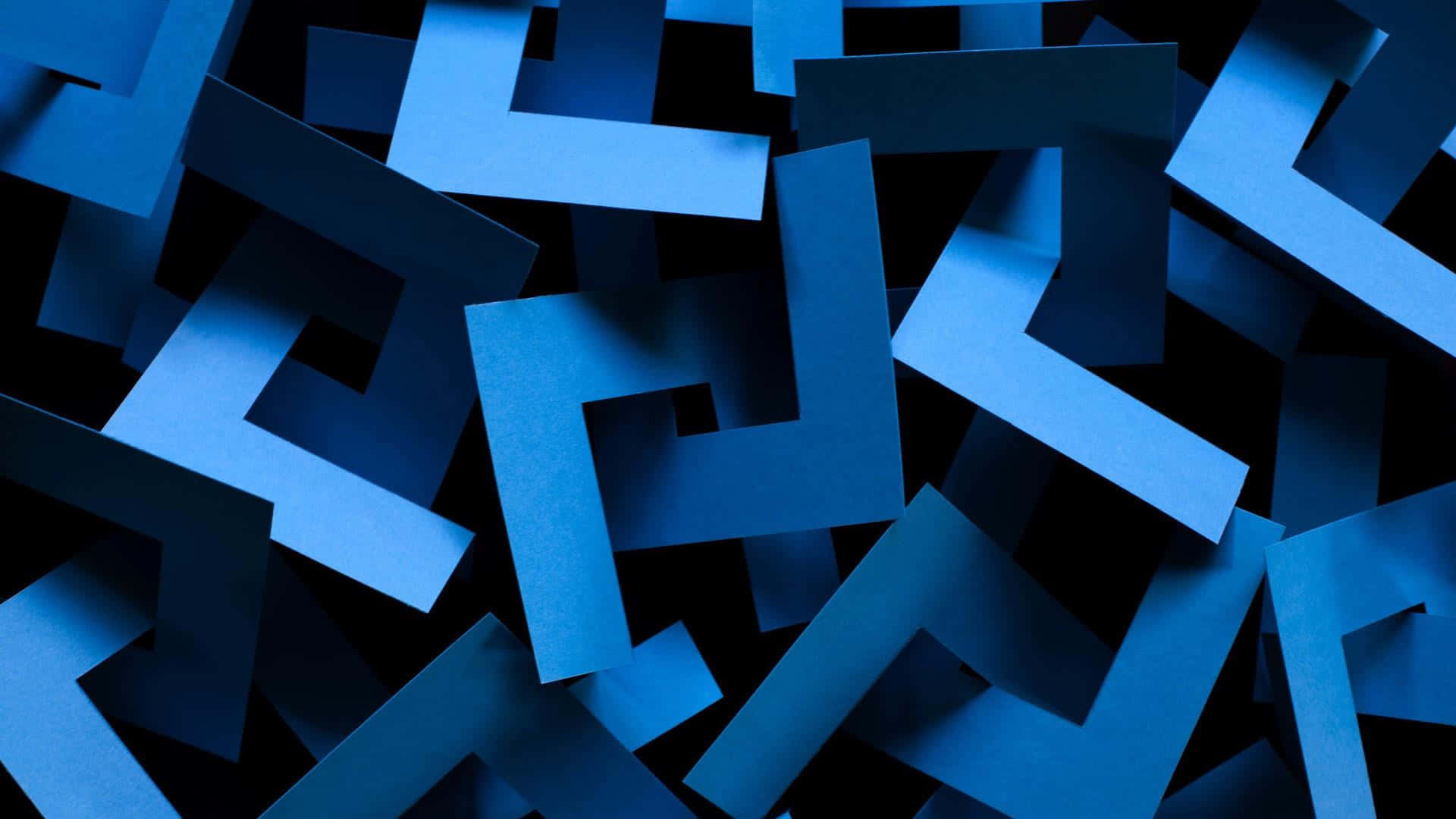 Blue Geometric 桌布 壁紙 — 抽象藍色幾何形狀在深色背景上以動態3D構圖重疊。