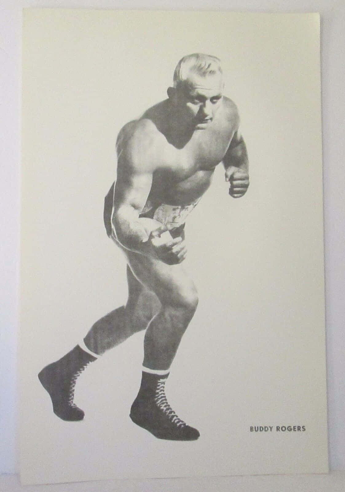 WWE 桌布 壁紙 — 摔角手 Buddy Rogers 以動態戰鬥姿勢展現強烈專注力的黑白照片。