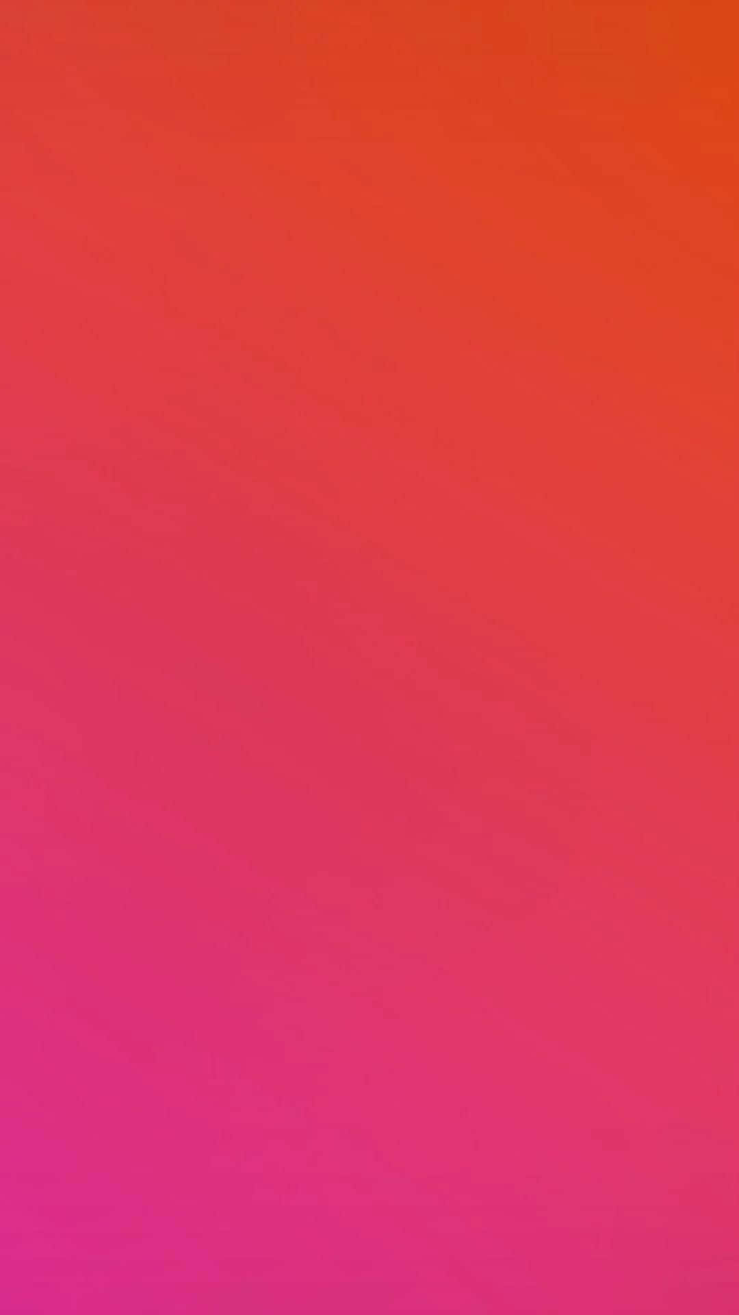 Pink And Red 桌布 壁紙 — 整個畫面呈現從火橙色到鮮豔洋紅色的平滑漸變。
