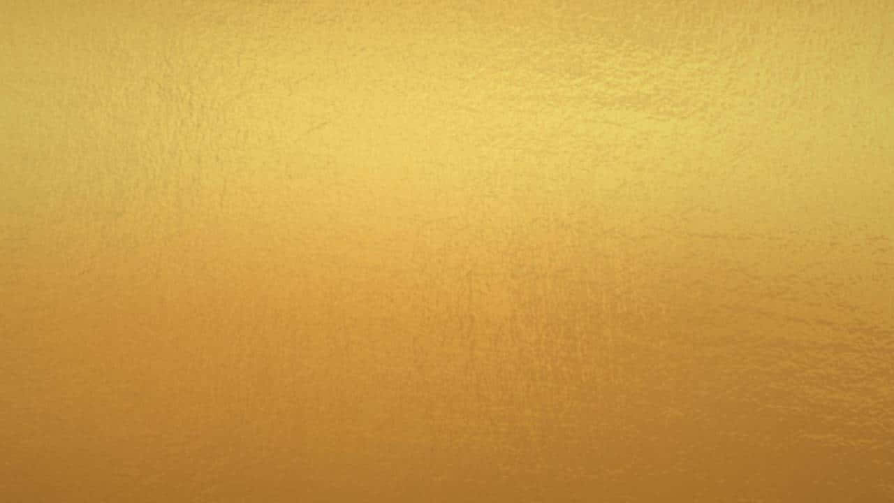 1280x720 桌布 壁紙 — 整個畫面呈現溫暖金色調的平滑漸變，帶有細微紋理。